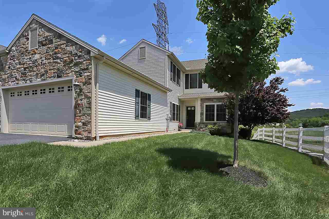 Stunning end unit townhome in Deer Run Commons development!!! 2,600 sq ft includes a first floor master bedroom with vaulted ceilings. Quartz countertops, stainless steel appliances and hardwood floors sets this kitchen apart. French doors open into a sun room lines with windows. 2 car garage provides plenty of off street parking. 1,700+ sq ft of unfinished basement offer additional storage or endless possibilities.