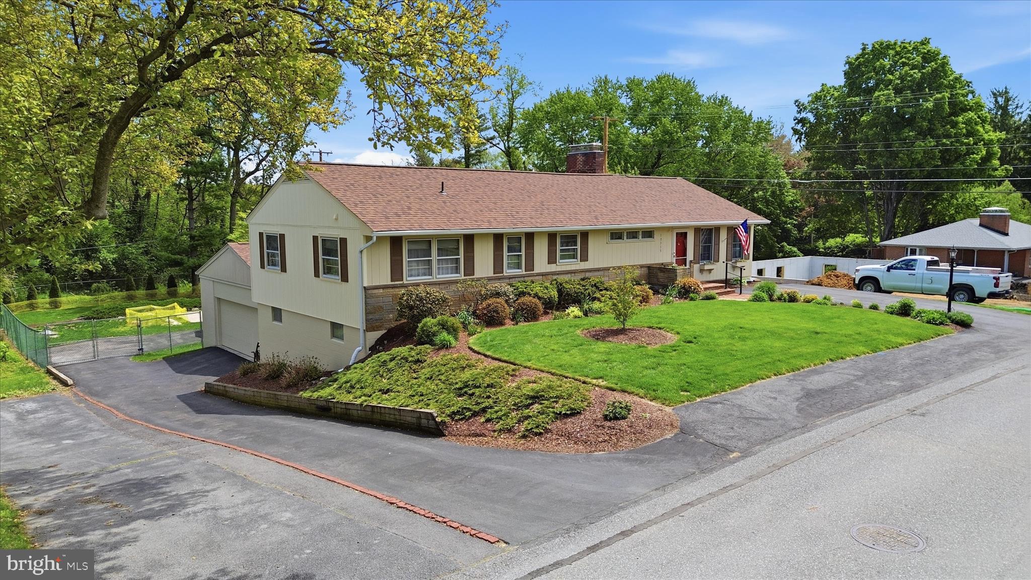 Charming, Move-In Ready Rancher in Sought-After Fountainhead!
Welcome to this beautifully maintained five-bedroom, two full bath home, ideally located just a short walk from Fountainhead Country Club. Thoughtfully updated and meticulously cared for, this spacious rancher offers the perfect blend of comfort, functionality, and peace of mind. The main level features three generously sized bedrooms, a full bath, a bright and inviting living room, formal dining room, and a large music/computer room. The eat-in kitchen is enhanced with under-cabinet LED lighting and newer appliances, including a refrigerator, microwave, and disposal, making it both stylish and functional for everyday living. Extra storage is available in the attic. The partially finished lower level expands your living space with two additional bedrooms, a second full bath, a recreation room, laundry area including new washer and dryer (2026), and a workshop. Updated basement flooring and a radon mitigation system add both comfort and confidence, while the walkout terrace level provides easy access to the fenced back yard. This home has seen extensive recent upgrades, including new roof on home and two-car garage (2025), new heat and humidity countering attic fan (2025), and a new heat pump (2025), offering year-round efficiency and comfort. Additional improvements include a new water heater (2025), newer oil tank, upgraded electrical system with a completed inspection (2025), and a generator with manual transfer switch (2024) for added reliability. Step outside to a beautifully maintained back yard, surrounded by a 6ft high chain link fence featuring a separate pet/play area under the covered under-deck ceiling (2025), and new walkways, perfect for relaxing and entertaining. The new front and storm doors (2025), updated siding, and custom lighting (including dimmable and security lights), add to the home’s curb appeal and charm. Car enthusiasts and hobbyists will love the two sideloading, detached garages (one oversized two-car and one single-car), and additional parking. Each garage has a window for ventilation and is wired for electricity. This well-cared-for home offers exceptional space, thoughtful upgrades, and an unbeatable location. Don’t miss this opportunity! Select furnishings may be negotiable.