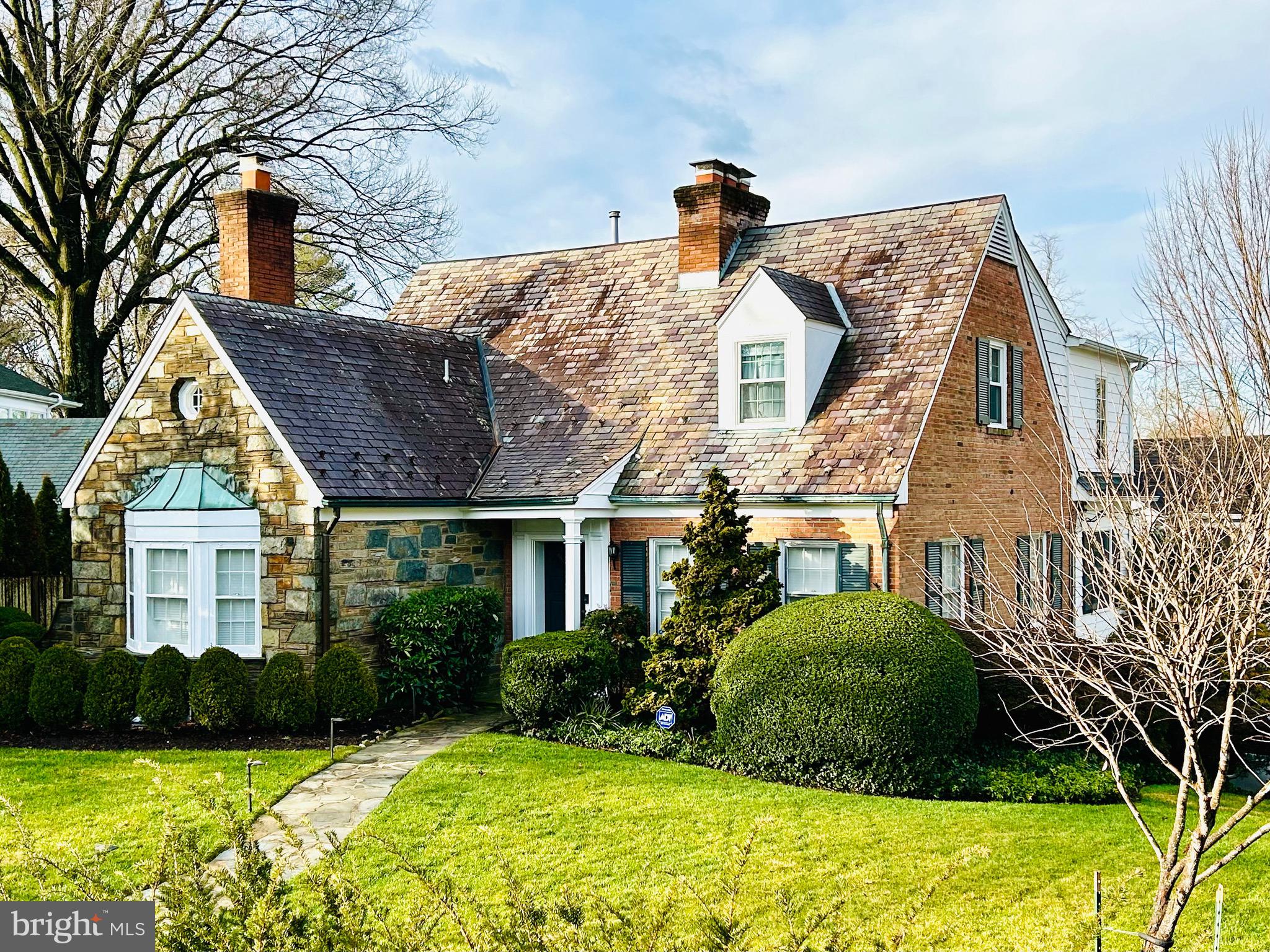 Live the lifestyle.  Cherish the memories.  Love coming home.

Welcome to 5210 Falmouth Road!  

This enchanting residence is perfectly nestled on a peaceful cul-de-sac within the highly desirable neighborhood of Westmoreland Hills.  Its classic Cape Cod-style architecture exudes timeless charm with a gentle blend of stone & brick work, an impressively pitched main roof complete with "Vermont-style" slatework & flared chimney tops, an octagonal window, and a charming front dormer to complement the copper-roofed bay window.  The home style captures the essence of New England's architectural heritage introduced to Maryland.

Inside, the house boasts an inviting interior featuring handsome hardwood floors, a trio of fireplaces, new windows that bathe the residence with natural light creating an atmosphere of comfort and warmth.  
The main level features a welcoming living room, a separate formal dining room, a private library complete with built-ins, a wonderful sunroom/office/flex space, and a delightful kitchen ready for special holiday meals at home.  
The second floor offers a haven of comfort with the owner's suite with private bathroom and two secondary bedrooms, each with bathrooms. 
The lower level delivers a variety of possibilities; an expansive recreation room, office/den, mud room with extra storage, full bathroom, laundry and a very convenient garage. Garage has an electric car charger already built in.
The exterior features an abundance of mature & vibrant plantings and a private, fully fenced-in backyard, ideal for dining al fresco on the flagstone patio. 

 

Westmorland Hills offers close proximity to the Creekside, and Little Falls Stream Valley Trails (connecting directly to the Capital Crescent Hiker / Biker Trail), Battery Bailey (a civil war historic site), and the local Westmorland Park to enjoy outdoor activities.  Remarkably convenient to Washington, D.C., providing residents with easy access to the nation's capital as well as downtown Bethesda & Friendship Heights for ease of shopping, dining, and the Friendship Heights Metro Station.

With its perfect blend of classic elegance and natural beauty, this beautiful home won't last!
