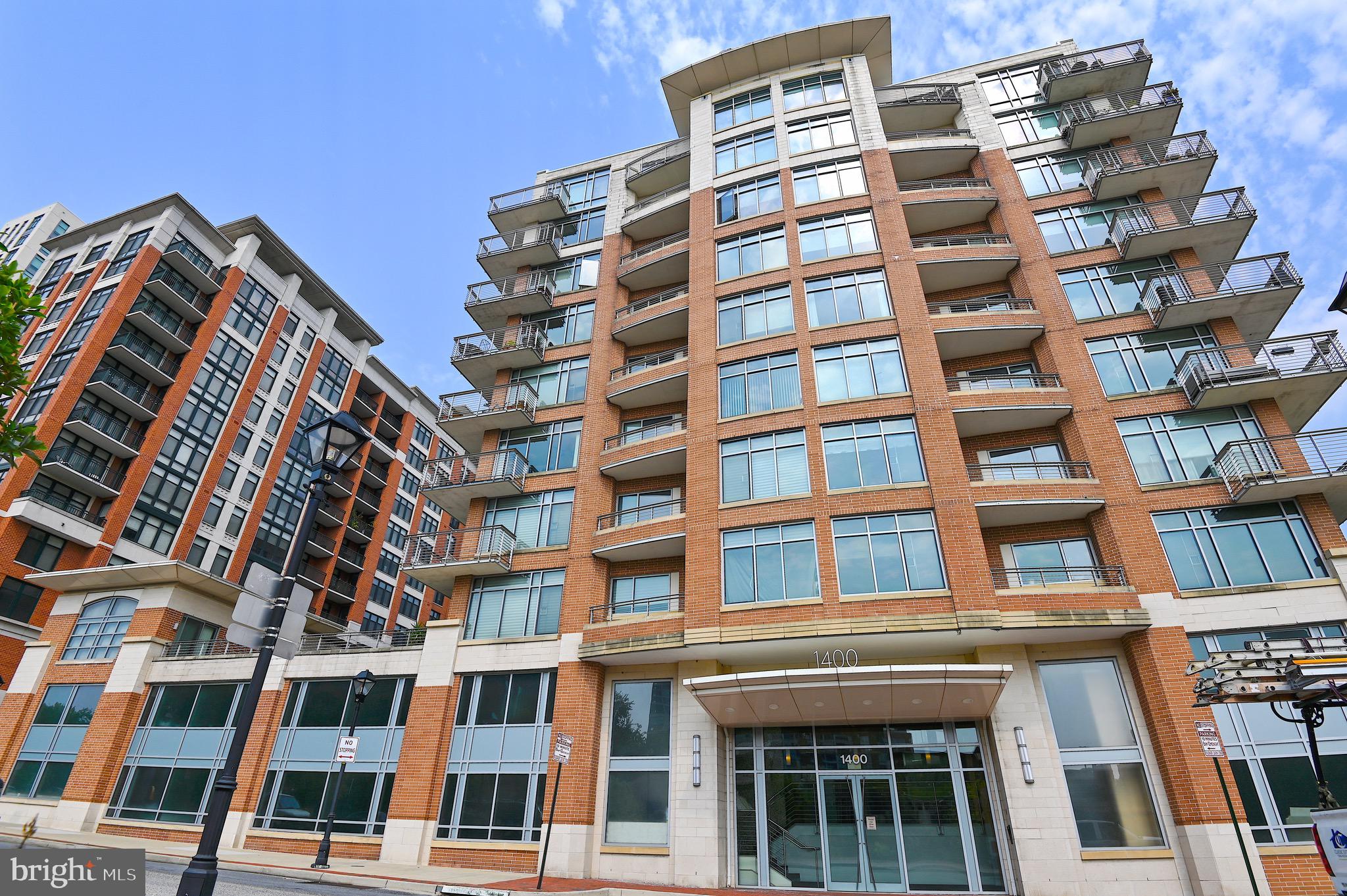 **Stunning Harbor East Condominium with Dual Primary Suites**

Discover the ideal blend of luxury and urban convenience in this remarkable Harbor East condominium, featuring two generously sized primary suites. This east-facing unit boasts an abundance of natural light, thanks to its wide open spaces and expansive walls of windows. 

As you enter, a gracious entrance hall welcomes you to a gourmet kitchen, equipped with custom cabinetry, contemporary countertops, and stainless steel appliances. The spacious living room, complete with a cozy fireplace and custom built-ins, creates a perfect area for relaxation and entertainment. The layout also includes a dedicated dining area, a convenient laundry/utility room, and a convenient powder room.

The first primary bedroom is a true retreat, featuring a large private bathroom with a double vanity, a soaking tub, a separate shower, a walk-in closet, and access to a private balcony. The second primary suite offers an en suite bathroom, ample closet space, custom built-ins, and an additional balcony that can be accessed from both the great room and the bedroom.

Enjoy breathtaking city views and abundant sunshine from every window in this exceptional home. Located just steps away from Whole Foods Market, an array of restaurants, shopping venues, a movie theater, Historic Fells Point, Little Italy, and the scenic Inner Harbor, this condominium epitomizes urban living. With easy walk ability to everything. 

Additional perks include two garage parking spaces and extra storage for your convenience. Don’t miss this opportunity to experience the best of city life!