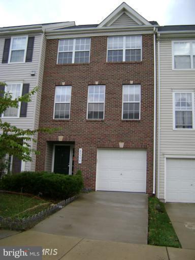 Exceptional Brick Front, 3BR/2.5BA One Car Garage Townhouse w/3lvl Bump Outs, Sunroom and Walkout Basement. Center Island Kitchen, Hardwood on Entire Main Level, 3-Sided Fireplace in Kitchen/Family Room/Sunroom, Vaulted Master Bedroom Ceiling . Fenced in Backyard .Call for Questions & Before sending app. Tenant is in the process of Moving out so excuse the mess.