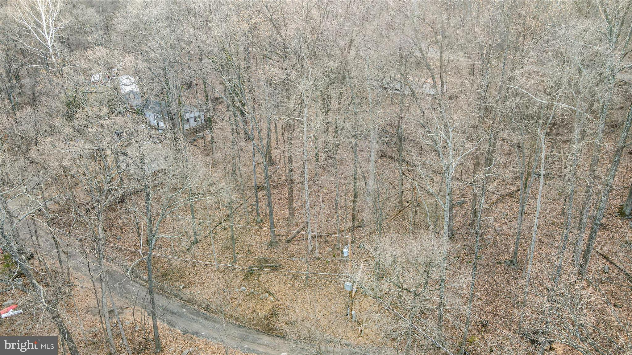 Private wooded lots, with road frontage, located on Woodpecker Lane in Harpers Ferry.  The property provides privacy while maintaining proximity to nearby homes, increasing the likelihood of utility connections.  No wetlands, no flood zone.  Conveniently located near commuter routes, shopping and outdoor destinations.  This parcel is ideal for future homesite, recreational use or long-term investment in a quiet mountain setting.

Seller offering $1,000.00 closing cost credit to buyer