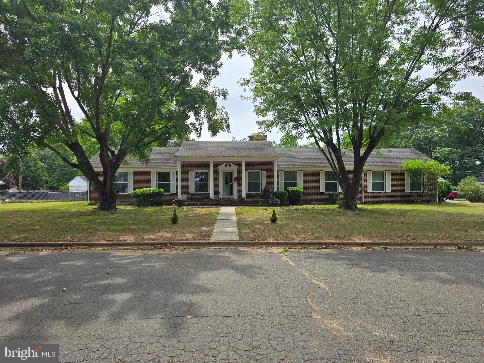 Custom Brick Rancher with  2500 sq ft of living space sitting on over half an acre just outside of downtown Federalsburg overlooking Chambers Park is waiting for you to come see to appreciate.  Owners have done many improvements and upgrades to the property, but left some of it's timeless charm. New carpet has been installed on the porch, breakfast nook, and family room July 2026, new windows 2026, New refrigerator July 2026, new HVAC 2021,  3yr old whole house water treatment with R/O system, and a 40 breaker 4D electrical panel is new, too!  With a mix of formal rooms and recreation areas  all off the kitchen, but split from the generously sized Bedrooms,  you will have no problem entertaining all year round.  2 Sheds, both with electric, one with garage door and workbenches help with all those indoor and outdoor projects.  3rd full bath is off the enclosed sunporch for ease of use from multiple areas and outside. In addition to Chambers Park the Federalsburg Park and Marina is just down the road for added recreation, along with shopping and restaurants in Federalsburg, Easton, Preston,  or just over into Delaware not to mention multiple Beaches in both MD and DE that are close enough to spend the day and come back home. Don't miss your opportunity to see this one and call it yours!
