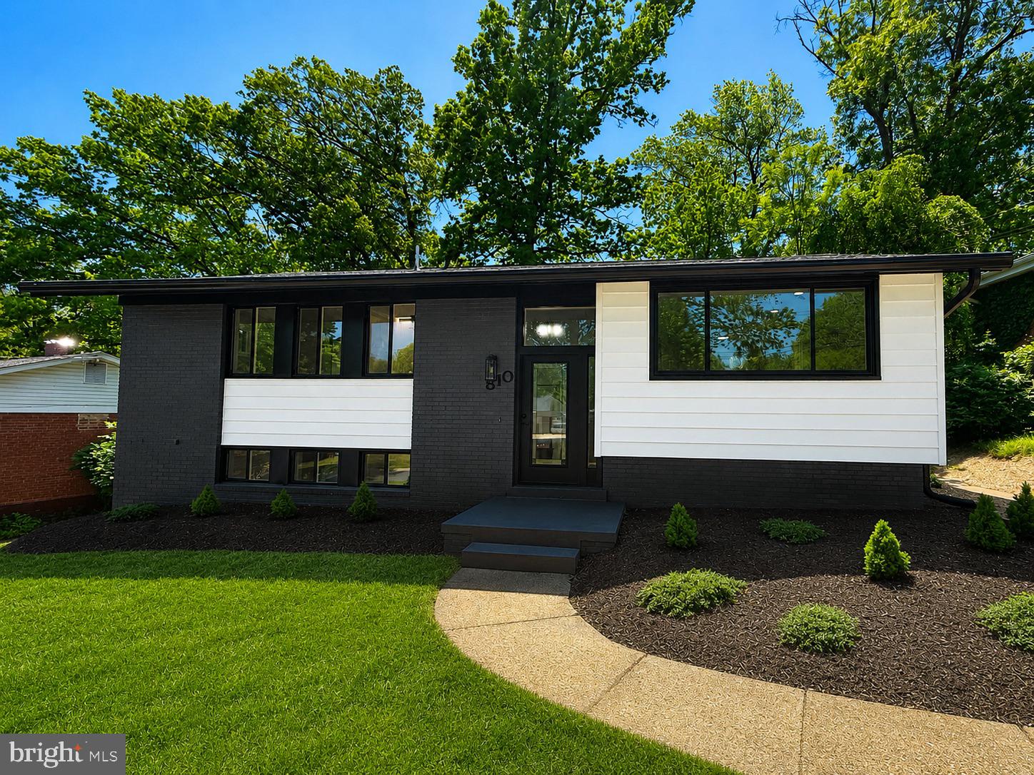 Completely rebuilt, redesigned, and reimagined from the framework out, this stunning renovation offers the style, efficiency, and peace of mind of a brand-new home while maintaining the charm of an established community. Nearly every major component has been replaced, upgraded, or modernized, creating a truly turnkey opportunity for today’s buyer.

Step inside to discover a thoughtfully redesigned open-concept floor plan featuring luxury vinyl plank flooring throughout, recessed LED lighting, upgraded dimmable light switches, and a beautifully designed kitchen centered around a large quartz island perfect for entertaining. The kitchen also features brand-new cabinetry and Whirlpool stainless steel appliances.

This home’s extensive infrastructure upgrades include a new 200-amp electrical service, new electrical meter and panel, all new wiring, outlets, switches, plumbing, plumbing fixtures, hot water heater, architectural shingle roof, energy-efficient windows and doors, upgraded insulation in both the exterior walls and attic, a new high-efficiency natural gas furnace, and a new A/C system — bringing the home up to modern energy standards rarely found in this community.

Enjoy outdoor living on the newly constructed composite deck with sleek cable railing overlooking the spacious backyard with storage shed. The upper level offers 3 bedrooms, while the lower level includes 2 large flex rooms ideal for additional bedrooms, home offices, media rooms, fitness areas, or creative spaces. The home also features 3 beautifully updated full bathrooms with custom tile surrounds, a new washer and dryer, and quality finishes throughout.

Located in a quiet neighborhood, this exceptional home delivers the comfort, efficiency, and modern design today’s buyers have been searching for. Schedule your private showing today!
