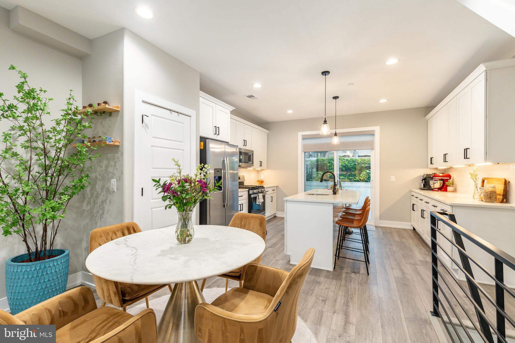 This thoughtfully designed 4-bedroom, 3 full bathroom home with approximately 6 years left on a full tax abatement blends modern finishes with a functional layout, blocks from Fishtown and the Berks Street L going into Center City. For qualified buyers take advantage of the Bank of America Grant program providing up to $17,500 in free grant money or PHFA allowing 3% down and up to a 5% grant! 

The open-concept main level features a bright living and dining area with large windows, recessed lighting, and built-in Bluetooth speakers that span to the 3rd floor and roof deck! The kitchen is equipped with white shaker cabinetry, quartz countertops, a spacious island, subway tile backsplash, and a full suite of GE stainless steel appliances with gas range. Off the kitchen is a small area for grilling.

Heading to the 2nd floor you will find 2 bedrooms offering flexibility for guests, office space, or fitness and a full bathroom with laundry room in the hallway. A spacious primary suite on the 3rd floor with tray ceiling, 2 closets including a walk in, and a beautiful en-suite bath featuring a double vanity and oversized glass-enclosed shower. A fully finished lower level provides a movie room/4th bedroom/office space with closet space, utility closet (with oversized 50 gallon hot water tank) and a 3rd full bathroom. 

Finally, make your way to the fully finished roof deck with expansive skyline views of center city and L train giving you the ultimate city living experience! Located just steps from Norris Square Park and within minutes of Fishtown, with convenient access to Interstate 95 and SEPTA. Nearby dining includes Suraya, Pizzeria Beddia, Kalaya, Picnic, Stateside Vodka, and FORIN coffee. Close proximity to Temple University and local amenities. Inquire within!