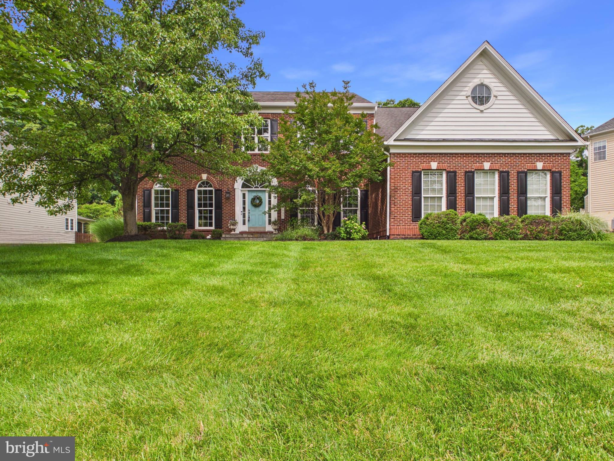 OPEN SUNDAY 12-2.  Incredible, private retreat. Flooded with natural light, the main level welcomes you with a dramatic two-story foyer, sweeping staircase, and an entertainment-sized dining room with a well-appointed butler’s pantry.  The living room offers flexibility as a second private office, complementing the dedicated main-level office for today’s work-from-home lifestyle.  A conveniently located powder room offers excellent potential for conversion to a full bath, creating the opportunity for a main-level bedroom suite—perfect for multi-generational living or aging-in-place flexibility.  Seller will consider a credit toward completion of the full bath with an acceptable offer.

The gourmet kitchen features a large center island, stainless steel appliances, built-in work desk, abundant white cabinetry, and modern finishes, opening seamlessly to the main living spaces. The stunning two-story family room is a true focal point with floor-to-ceiling windows, a coffered ceiling, and cozy gas fireplace—ideal for everyday living and entertaining.

Upstairs, the spacious primary suite offers a private retreat with sitting area, oversized walk-in closet, and fully renovated spa-inspired bath featuring dual quartz vanities, free-standing soaking tub, frameless glass shower, and heated floors.  Three additional bedrooms are generously sized with access to completely updated baths, including a buddy bath and private en suite.  The upper-level laundry room adds convenience with utility sink, built-in storage, and new washer and dryer.

The fully finished walk-up basement expands the living space with a large recreation room, game area, home gym, and custom bar with beverage coolers.  A private guest suite with luxury spa bath, steam shower, and walk-in sauna makes this level ideal for extended stays or guest accommodations.

One of today’s most sought-after lifestyle features- the outdoor living in the home is exceptional, featuring a screened porch with wood-burning fireplace and low-maintenance tile flooring.  The expansive paver patio provides space to relax or entertain, and a fully fenced yard and a beautiful backdrop of mature trees provides peace and absolute privacy.

Completing the home is an oversized three-car side-load garage with additional storage space—perfect for a workshop or car-lover. Thoughtfully updated throughout,  by the original owners, this exceptional property is truly turnkey and ready for immediate occupancy.  Ideally located between Brambleton Town Center and Broadlands offering shopping, dining, and amenities, with optional pool membership available.   Located in the Briar Woods HS pyramid - Waxpool ES, and Eagle Ridge MS.  Easy access to the Silver Line Metro (less than 2 miles), Dulles International Airport, and major commuter routes including Route 7, Route 28, Route 267 (Dulles Toll Road), and Loudoun County Parkway.  
<BR><BR>

STANDOUT FEATURES

🏡 Interior Highlights
• 🍽️ Updated kitchen with modern finishes
• 🛁 All bathrooms fully renovated with cohesive, high-end design
• 🔄 Front and back staircases for everyday convenience and flow

🎉 Entertaining & Lower Level
• 🍸 Gorgeous, entertainment-sized bar in the basement—perfect for hosting

🌿 Outdoor Living
• 🌳 Backs to woods for privacy and peaceful views
• 🛋️ Spacious 20x16 screened porch with vaulted ceiling, wood-burning fireplace, TV (conveys), and stylish wood-look tile flooring
• 🪜 Step down to an expansive paver patio and fully fenced rear yard

🚗 Exterior & Systems
• 🚘 Three-car, oversized side-load garage with excellent curb appeal
• 🏠 Architectural 35-year roof
• ♨️ New water heater (2020)
• ❄️🔥 New upper-level heat pump (2026)
• 🛠️ All systems regularly maintained