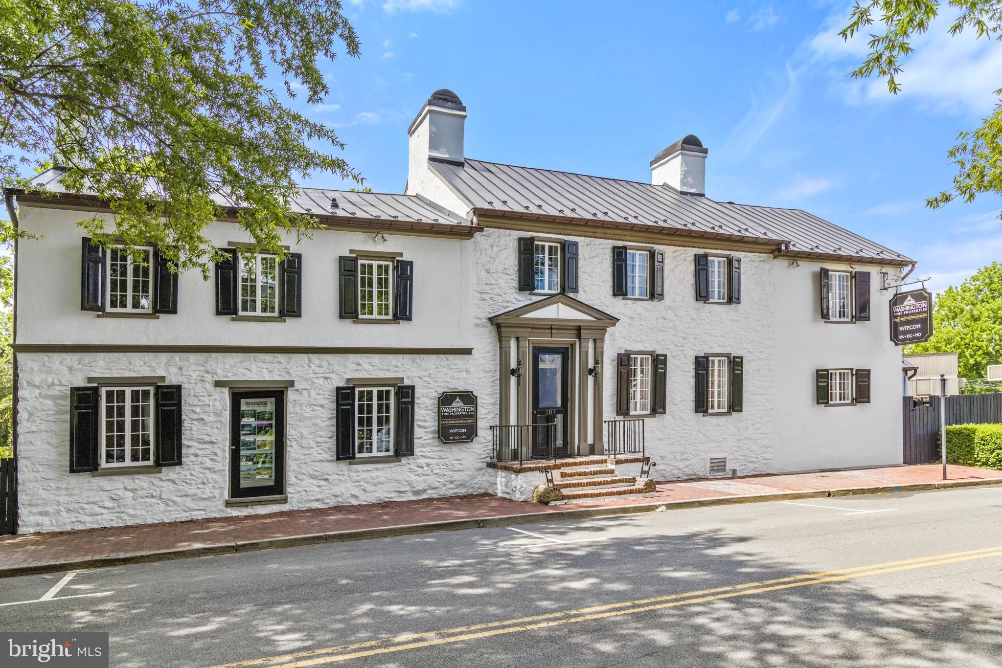 RARE IN-TOWN OPPORTUNITY WITH SO MANY OPTIONS - RESIDENTIAL, COMMERCIAL, LAND!  An AMAZING historic residence centrally located in the town of Middleburg.  It last functioned as mixed-use office/commercial space but has the floorplan for a classic residence.  Constructed circa 1780, the Bower House exhibits a Federal style and is one of the best remaining eighteenth-century stone buildings in Middleburg. Also included is an additional approximately 11,326 square foot lot which is separately deeded. Features include an elegant spiral staircase, stately fireplaces, exposed timber ceilings, natural hardwood floors, and graceful French doors leading to a charming patio connected by a brick walkway to the expansive garden and additional lot. In “The Nation’s Horse and Hunt Capital.” Priced to sell! Loudoun County Tax ID 538290964000 and 538290376000. Owners are licensed real estate brokers.