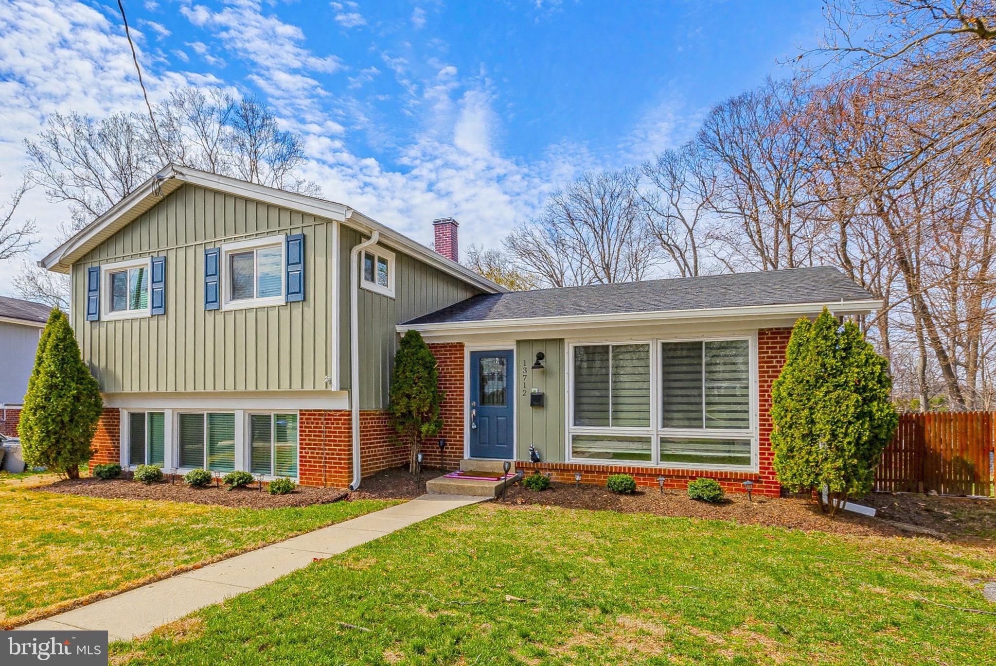 OPEN HOUSE SATURDAY MARCH 28th (1-3pm) and SUNDAY MARCH 29th (2-4pm) .....Spectacular new listing in sought after Aspen Knolls! This stunning split level home features an open concept main level complete with living room, dining area, and a gorgeous gourmet kitchen with island! The upper level holds two large guest rooms, an updated hall bathroom, and a spacious primary bedroom with a luxurious en-suite bathroom and plenty of closet space! A finished lower level  holds a relaxing family room, a sunfilled office space, half bathroom, laundry room, and access to a private sunroom addition! The perfect backyard is fully fenced, offers plenty of green space, and includes a recently installed patio that is perfect for summertime entertainment! This home is loaded with updates including roof, siding, and windows! Truly a move-in ready property! Enjoy close proximity to area schools, local shopping, and Red Line Metro! COME QUICKLY!
