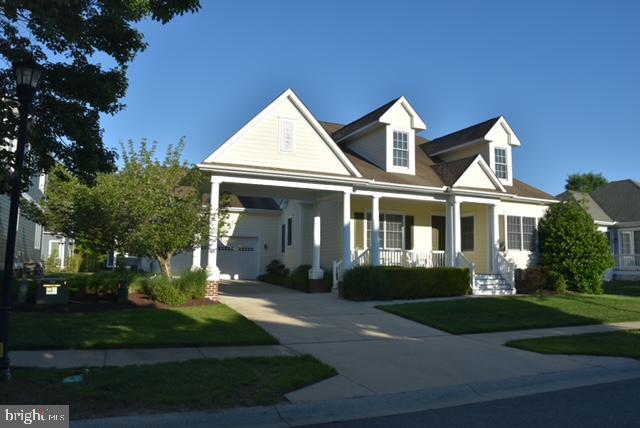 Welcome to Bayside living at its finest in Bayside Resort Golf Club! This beautifully updated 4-bedroom, 2 1/2-bath home offers the perfect blend of comfort and coastal charm. Freshly painted throughout and featuring brand-new flooring, this home feels bright, clean, and completely move-in ready.

The spacious layout offers plenty of room for family and guests, with generously sized bedrooms and inviting living spaces ideal for entertaining or unwinding after a day at the beach or on the course.

Life in Bayside means enjoying a premier coastal lifestyle. Residents have access to exceptional amenities, including multiple indoor and outdoor swimming pools, a fully equipped fitness center, tennis and pickleball courts, scenic walking trails, and a dog park. A convenient shuttle makes beach days at Fenwick Island State Park effortless. Community dining options include Signatures at Bayside and 38 Degrees, and residents enjoy live performances and events at the renowned Freeman Arts Pavilion.

Everyday conveniences are just moments away — grocery shopping, pharmacy services, plus nearby restaurants, ice cream, and banking. The beaches of Fenwick Island and Ocean City are only minutes from your door.

Whether you're searching for a primary residence, vacation retreat, or investment opportunity, this home offers the complete Bayside lifestyle. Schedule your private showing today!