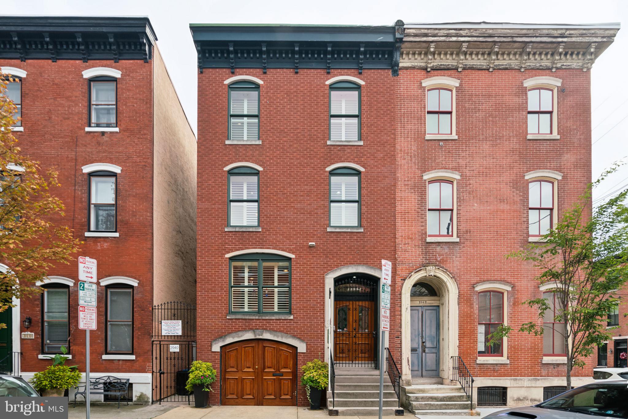 Impressive and stunning townhouse on premier block with garage plus an astonishing bricked and landscaped 50’ X 20’ rear garden. The lot size is 22’ X 101’  allowing very sunny and spacious interior rooms and views.  This 2635 sq. ft.  home was built from ground up in 1990-91 and underwent a complete and extensive new renovation down to the studs in 2010. 

Ground level:  One car garage with beautiful custom made barn garage doors. Garage has slot walls for hanging storage,  utility closet with central vac, Rinnai on demand hot water heater and the first zone of HVAC that is only 2 years old. This level has a 2nd hall storage closet plus another 7’ X 18’  storage room and a powder room with a cedar closet.

First Level:  Double French leaded front door,  step up to a large custom front gourmet kitchen outfitted with GE Monogram stainless double oven, microwave convection oven, French door refrigerator, Bosch dishwasher, GE Monogram cooktop, a huge amount of custom cabinetry and built ins with breakfast bar with room for 4 bar stools.  Off the kitchen is a cheery formal dining room overlooking the living room and a view of the rear garden.  A few steps down takes you to an enormous sun splashed living room with 12’ ceilings, custom ceiling fan, gas fireplace with custom builtin surround, gorgeous wood floors, enormous glass window wall with automatic awning, door to rear garden,  view of the very private 20’ X 50’ bricked and landscaped garden with mature plantings, irrigation,  and an  easement to Wallace Street.

Second Level:  Spacious staircase up to 2 bedroom suits. Front bedroom with en suite bathroom, 13’ of closet space (currently used as double office), full wall of custom shelving and cabinetry. Spacious hall with laundry center with front loading washer and dryer, tons of cabinetry, utility close housing 2nd HVAC, and a jetted laundry sink.  Very spacious and sun splashed rear guest bedroom complete with en suite bathroom, 13’ of closets, door to large terrace overlooking the garden and with cityscape views of center city.

Top Level:  Very spacious full floor Master Suite complete with gas fireplace with flat panel TV above, lots of custom built in shelving,  large walk-in closet, door to another terrace with awning and great city skyline views. Enormous front spa-like master bath complete with walk-in shower with rain head and shower wand, huge walk-in closet, plus a huge jetted spa-like soaking tub, heated towel rack, separate water closet, along with double sinks and double medicine cabinets. 

Custom louvered Casa Blanca window treatments through-out, hardwood floors, 2 zoned HVAC, 2 Rinaai on demand tankless hot water heaters, sprinklered garden and front planters, 3 full baths, 1 powder room, alarm system, central vac, and much more customization.