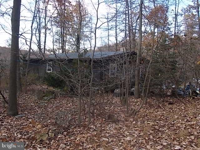Two parcels totaling 30.17 Acres. Two Bedroom Rancher Home. Home is in poor condition. Is Currently Occupied. Appraisal on file for $250,000 from July 2017.