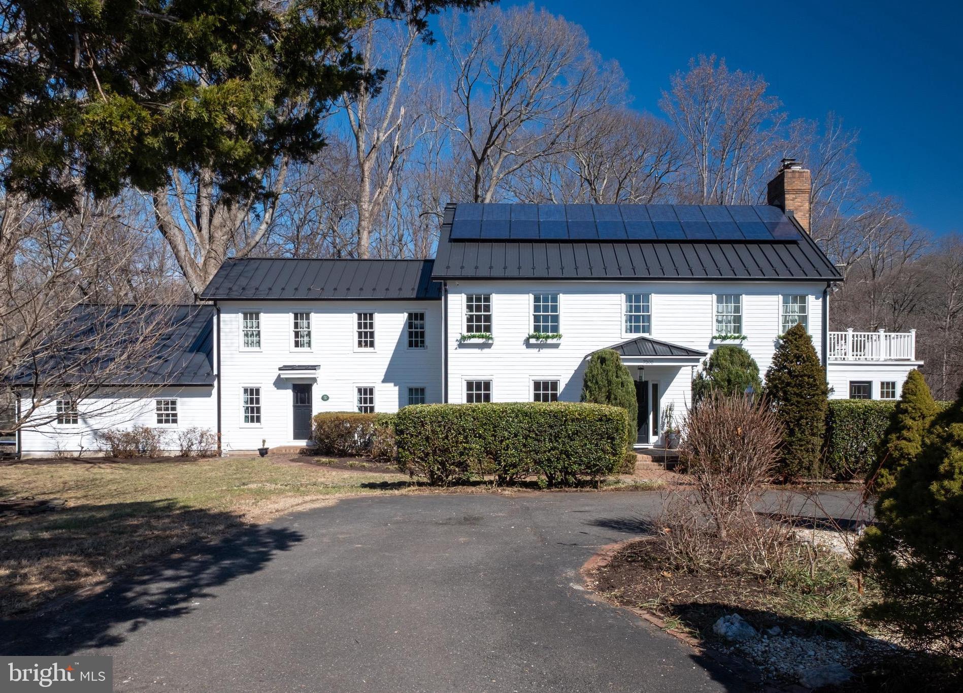 Charming Colonial Retreat on 5 Acres – Minutes from Clifton!

Tucked away at the end of a quiet lane, just minutes from the town of Clifton, this stunning 5-acre property offers a perfect blend of character, modern updates, and natural beauty. Featuring classic colonial architecture, authentic wide-plank pine floors, and thoughtful details throughout, this home is a must-see!
Highlights on the main level include wood floors throughout, an updated kitchen- remodeled in 2023 (quartzite countertops,  marble backsplash, JennAir appliances and Bosch dishwasher), a convenient main floor bedroom or office, full bath and over 1,000 sq. ft. of new composite decking and railing. Multi-tiered deck has plenty of room for entertaining and a spa on the lower tier. 
The second level includes a spacious primary bedroom with a wood burning fireplace, a private balcony and ensuite bathroom with marble double vanity and vintage claw foot tub. Wood floors can be found throughout this level as well. Three additional bedrooms, full bath, office, laundry room and bonus room are also found on this floor. 
The basement level walks out to a fenced area with tiered garden beds, perfect for a dream garden.  Pear, cherry, fig and apple trees are already planted! A cobblestone walkway leads you to a peaceful koi pond and a pergola, perfect for relaxing.
The paved driveway provides an abundance of parking options, along with a two-bay attached garage and a two-bay detached garage. 
Above the detached garage is a finished room with LVP flooring and a mini-split system (2022).  Between this space, a conditioned separate space on the basement level, eaves in the bonus room and an attic, there is no shortage of storage space!
The rear yard contains a large, flat grassy area that leads to paths through the woods that connect to the community's walking trails. A flagstone fire pit completes the yard for entertaining on chilly evenings. 
Other important updates include- new metal roof and gutters (2024), basement carpet (2024), exterior paint (2024).
This one-of-a-kind property seamlessly blends historic charm with modern conveniences, all within a peaceful, private setting.
Owner/Agent