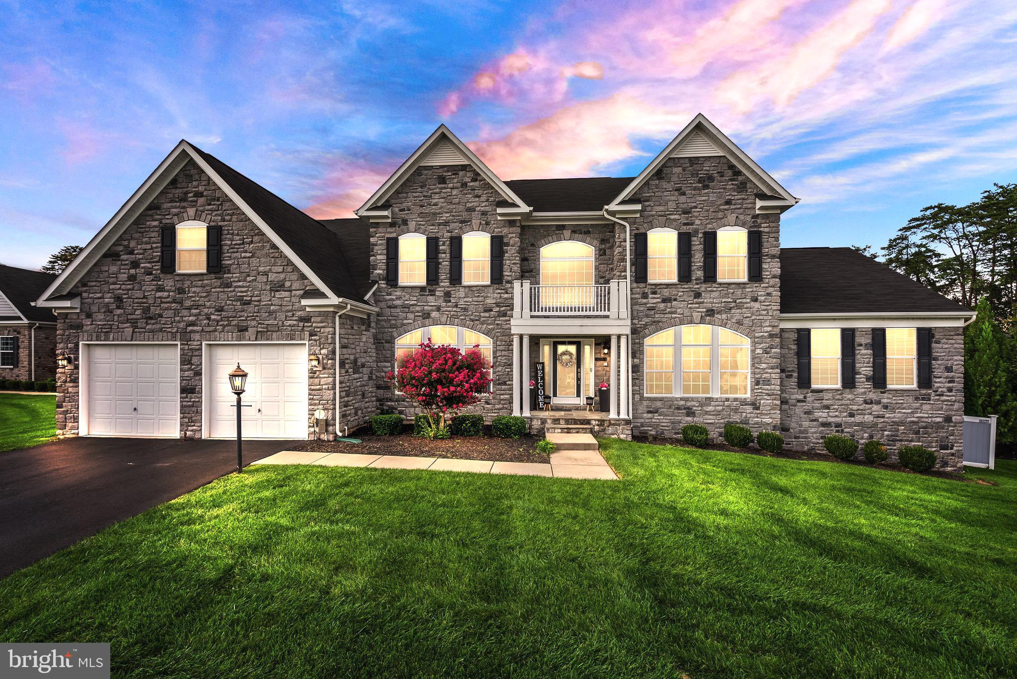 Indulge in the epitome of opulent living in this magnificent 5-bedroom, 6.5-bath haven nestled within Leesburg's esteemed River Point community. A showcase of sophistication, this residence boasts a finished basement with an entertainment area, home gym, and a colossal movie theater, promising a lifestyle of leisure and luxury.

The heart of this abode is the entertainer's kitchen, featuring stainless steel appliances, an indoor grill, and an oversized island with custom kitchen cabinets. Custom silhouette blinds adorn each window, adding a touch of elegance and privacy to every space. An open floor plan adorned with 9" wide plank hardwood floors seamlessly connects the kitchen to the morning room, formal dining, and living spaces, creating an ambiance of warmth and grandeur.

Each bedroom is a private sanctuary with its own en-suite bathroom and custom-built closets, while the main floor is graced by a double office, offering ample space for productivity. Custom built-ins elevate the functionality and style of various areas, providing storage solutions tailored to your needs. Step into the backyard oasis, where a 30,000-gallon oversized pool beckons, transforming the outdoors into a retreat of unparalleled luxury. This residence redefines living in River Point, setting a new standard for elegance, comfort, and sophistication.