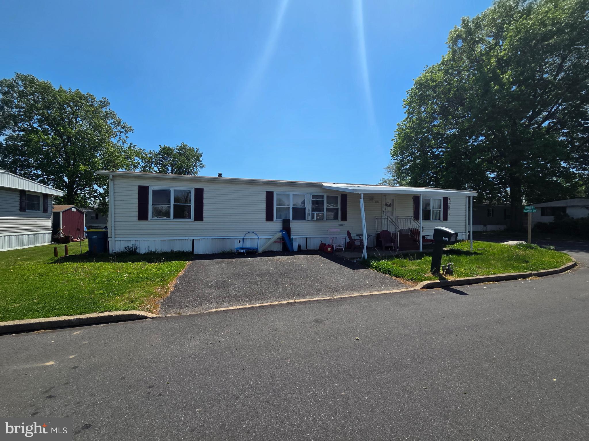 Welcome to 3072 Chandler Drive, located in the desirable Penwood Crossing community in Morrisville and within the sought-after Pennsbury School District. This double-wide home offers great potential for the right buyer and is ready for your personal touch. With a little TLC, this property can truly shine! 
The home features a two-car driveway for convenient off-street parking and is situated in a community packed with amenities, including a community pool and clubhouse with a party room available for gatherings and events.
The HOA fee covers snow removal, water, common area maintenance, and access to community amenities, making for low-maintenance living.
Conveniently located near major commuting routes, shopping, restaurants, and everyday conveniences, this home offers easy access to many desirable local amenities.
Don’t miss this opportunity to own in one of the area’s most desirable communities at an affordable price!