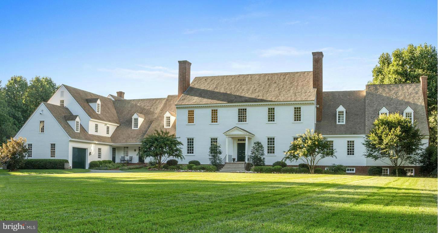 MAJOR PRICE ADJUSTMENT Stunning Williamsburg reproduction beautifully presented on 26 mostly wooded acres in the Comus area in upper MOCO. Exceptionally large rooms provide fabulous setting for grand entertaining both inside & out. Outstanding period mill work, master suite w/sun & shade porch, gourmet kit, au-pair suite, 8 wood burning fp, ballroom. One of the finest homes offered in the county!