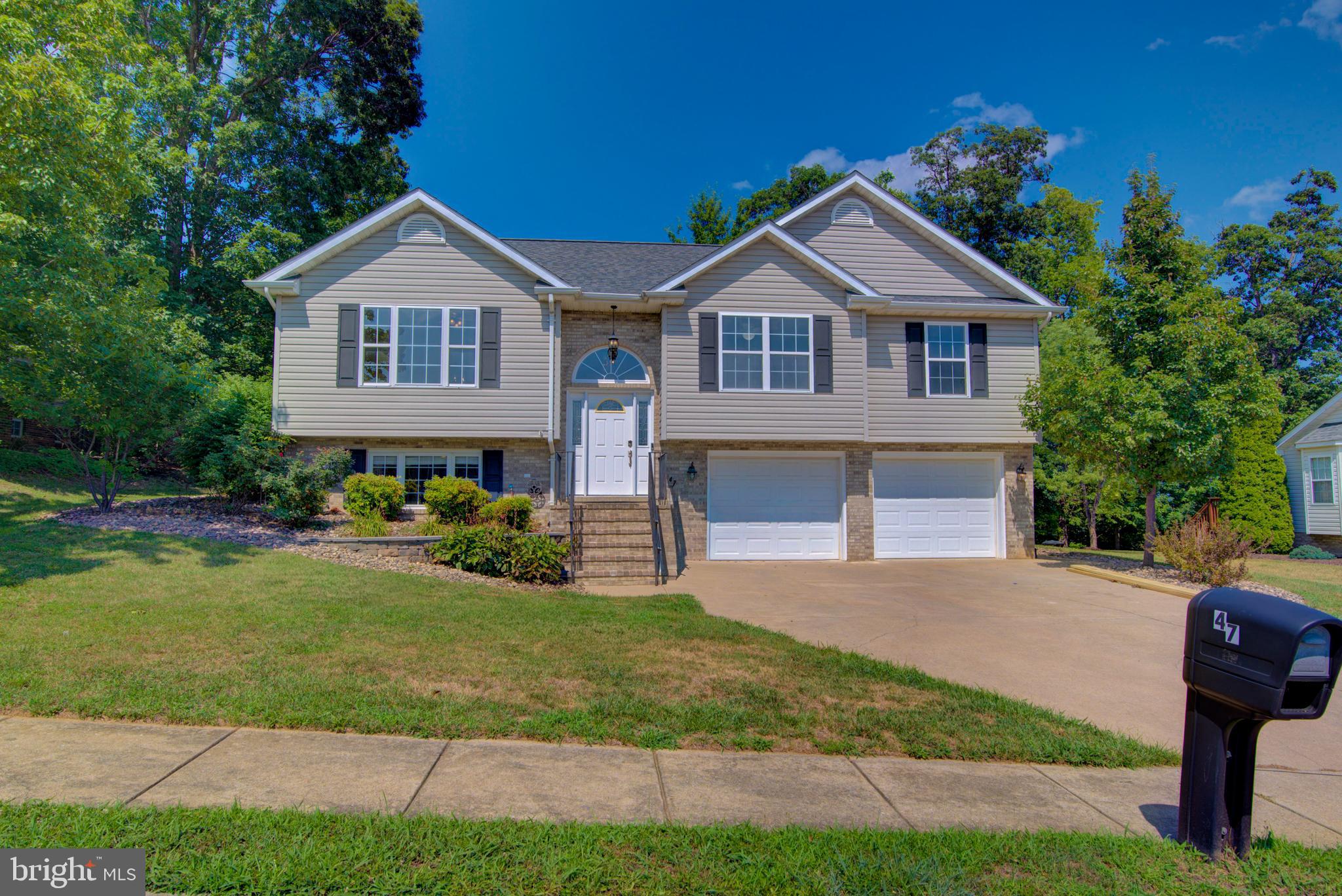 Nestled in the charming Madison Heights community, this delightful raised ranch offers a perfect blend of comfort and functionality. Built in 2002, this well-maintained home boasts 2,047 square feet of inviting living space, ideal for creating lasting memories. Step inside to discover a warm and welcoming atmosphere, featuring four spacious bedrooms and two and a half bathrooms. The heart of the home is designed for both relaxation and gatherings, ensuring everyone feels at ease. The exterior showcases low-maintenance vinyl siding, while the generous 0.33-acre lot provides ample outdoor space for gardening, play, or simply soaking up the sun. An attached front-entry garage with space for two vehicles adds convenience to your daily routine. The expansive yard offers endless possibilities for outdoor activities or creating your own private oasis. Located in a friendly neighborhood, this home is just a stone's throw away from local amenities, parks, and walking trails, making it easy to enjoy the best of suburban living. This property is not just a house; it’s a place to call home. Experience the warmth and comfort that awaits you in Madison Heights—schedule your private tour today! Agent related to Seller