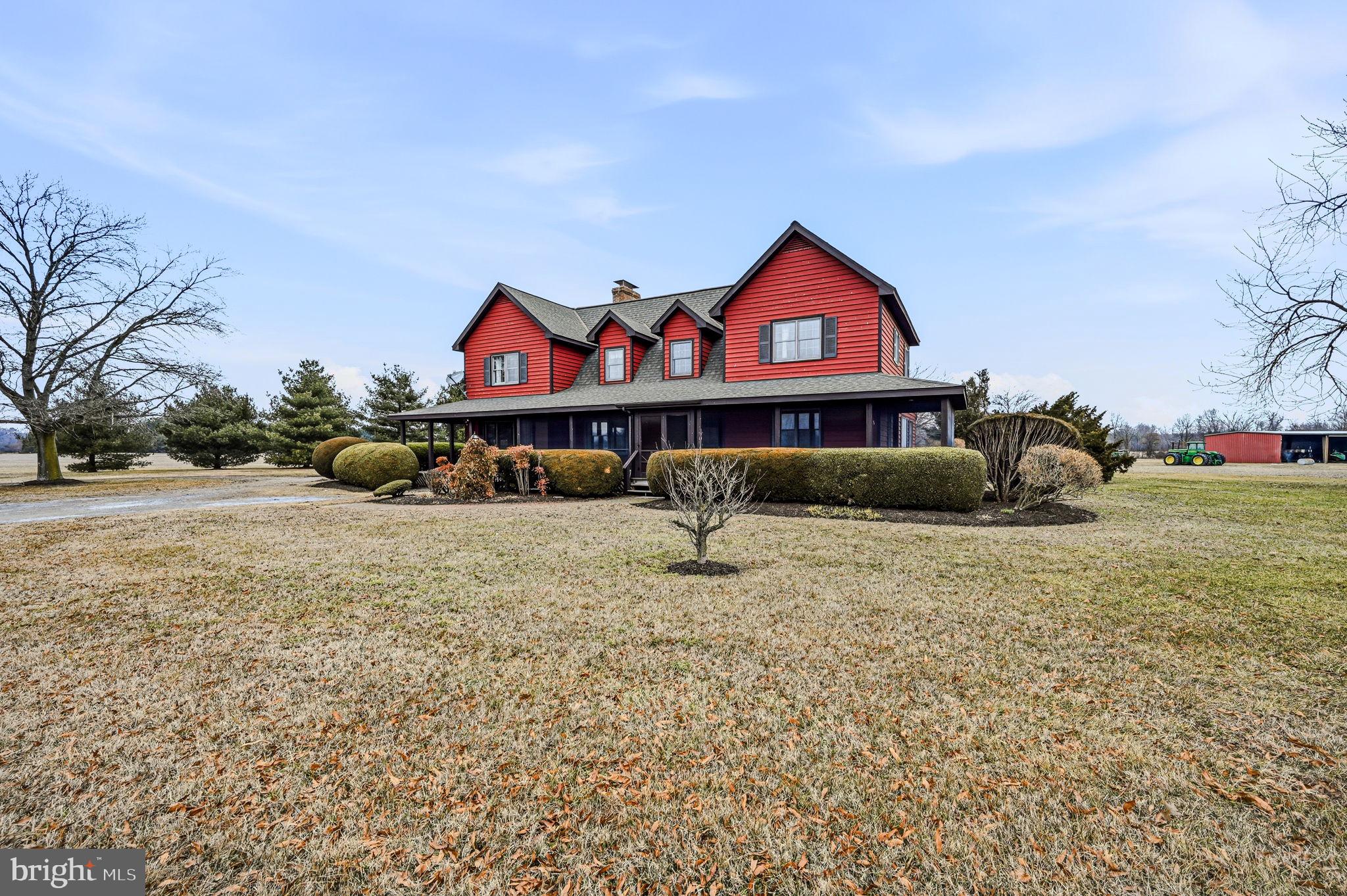 Beautiful farmstead situated on 410± acres, featuring 355± acres of highly productive tillable ground with approximately 210± acres under irrigation. The irrigation system consists of two pivots supplied by well water, supporting efficient and reliable crop production.

The property includes a very well-maintained two-story, custom home that offers comfort, space and functionality. The upper level features a private bedroom and bathroom, walk-in closet, living room, and office space highlighted by a cozy wood-burning stove. Two large balconies on the upper level provide stunning pastoral views overlooking the farm.

The main level includes three additional bedrooms, one full bathroom and one half bathroom, and an inviting gourmet kitchen and dining area with a large island and two skylights that flood the space with natural light—one positioned over the kitchen and one over the dining area. Adjacent to the kitchen is a large, comfortable living room with a wood-burning stove.  A hallway on the main level leads to the convenient half bath, mud room and laundry room, enhancing the home’s practicality for farm living.  The first floor also features a storage room and utility / mechanical room with interior and exterior access.

Outdoors, enjoy a deck off the the kitchen / dining area, paved basketball court located just behind the home and pastoral views.  Approximately 100 yards from the residence is a large farm building ideal for storing farm machinery and crop equipment. This property presents an excellent opportunity to own a high-quality agricultural operation paired with a welcoming country residence.

Professional Photos Coming Soon