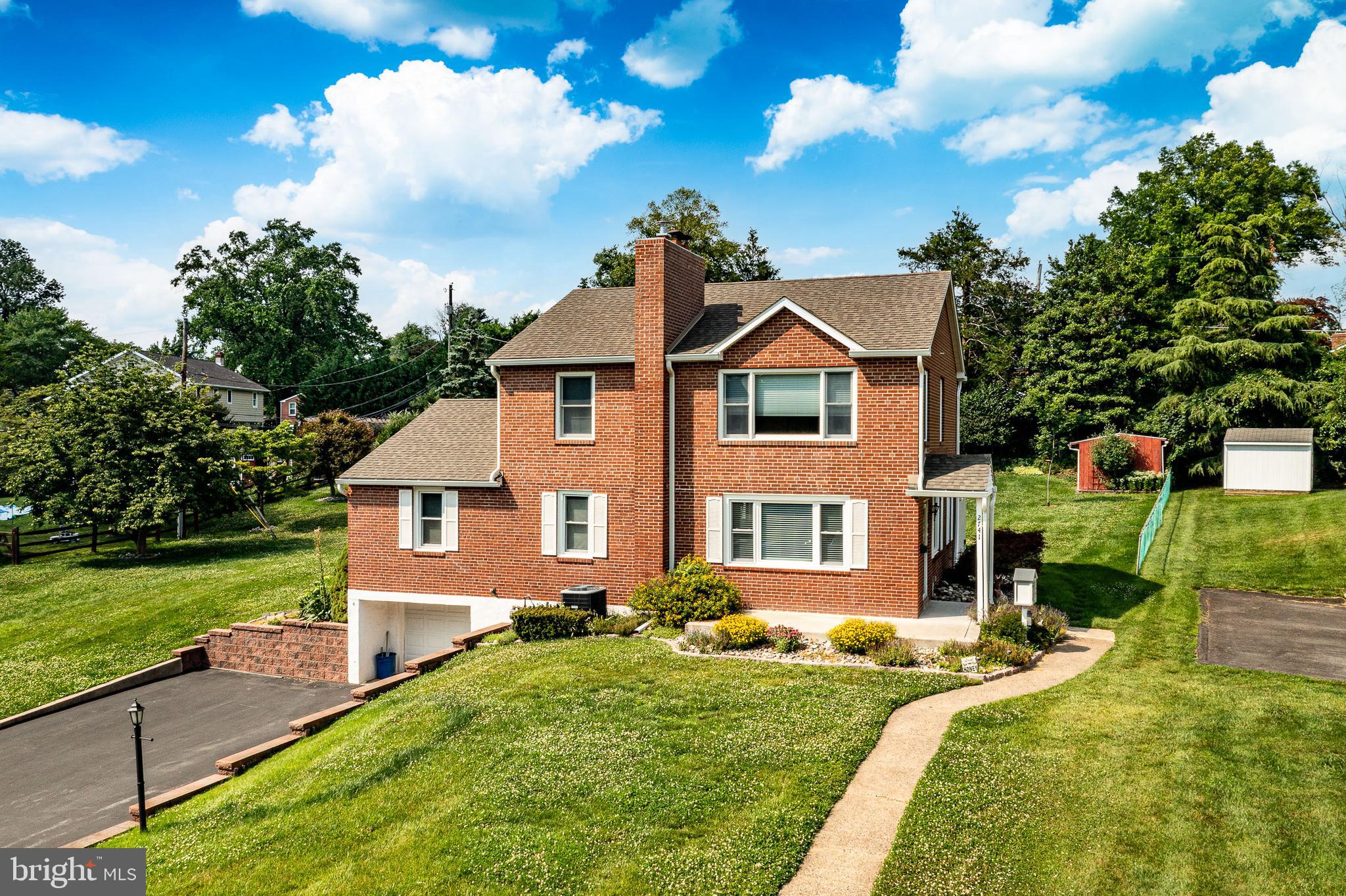 WELCOME to this beautifully expanded and impeccably maintained 4 bedroom home, situated on nearly a half-acre in a peaceful, highly desirable neighborhood.  
The welcoming entry level features a  family room centered around a brick, gas fireplace.  The main level also offers three generously sized bedrooms and a ceramic-tiled  hall bath.
At the heart of the home is the stunning custom kitchen, thoughtfully expanded in 2010.  It showcases handcrafted cabinetry, granite countertops, a six-burner gas range, walk-in pantry and french sliding doors (2023) with built-in blinds that open to the patio - ideal for indoor and outdoor entertaining.  
An additional entrance leads to a convenient mudroom with powder room and laundry area, flowing into a spacious dining area designed for everyday living and specials occasions.
The private upper-level primary suite is a true retreat, featuring a walk-in closet and an en-suite bath complete with a jetted soaking tub, oversized walk-in shower with dual shower heads, and plenty of space to unwind.  An adjoining bonus room offers endless possibilities as a nursery, home office, den, fitness room or sitting area.
The finished lower level provides abundant storage and additional living space, including a recreation room with a wood-burning fireplace, a dedicated movie room with surround sound speakers, a workshop, and an additional laundry hookup.  In addition to the one car garage with electric garage door opener, there is a storage shed with electricity.
Recent improvements include:  Expanded kitchen (2010), Widened asphalt driveway and retaining walls (2017), Expanded front patio (2020), Chimney repointed with stainless steel liner and rain cap (2020), French sliding door with built -in blinds (2023), New garage door (2023)
Throughout the home, you will find beautifully refinished original hardwood floors,  along with 3/4 inch oak hardwood flooring in the newer rooms.
With abundant off-street parking, carefully thought out updates and pride of ownership, this home is in absolute move in condition.  Unbeatable location close to shopping, dining, parks and major commuting routes.
A home that offers comfort, versatility and timeless appeal - ready for it's next owners to enjoy.