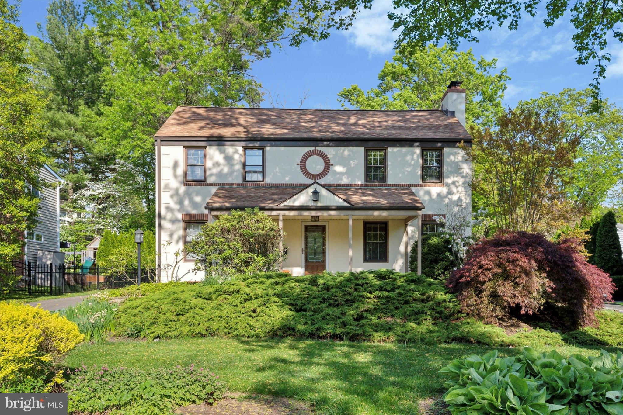 Welcome to this wonderful home in the highly desirable Shortridge neighborhood, ideally situated directly across from picturesque Shortridge Park. Located within the award-winning Lower Merion School District and zoned for Merion Elementary, Bala Cynwyd Middle School, and Lower Merion High School (buyer to verify), this home offers the perfect combination of space, convenience, and location.

Enjoy a truly walkable lifestyle with easy access to the Wynnewood Shopping Center featuring Giant Food Store, Spread Bagelry, PJ Whelihan’s, and more, along with nearby Whole Foods and SEPTA’s Wynnewood Train Station for a quick commute to Center City Philadelphia and the surrounding suburbs.

Inside, the home welcomes you with gleaming hardwood floors and an abundance of natural light throughout. The spacious formal living room is drenched in sunlight thanks to oversized windows and is anchored by a handsome wood-burning fireplace, creating a warm and inviting gathering space. The formal dining room flows seamlessly into the generously sized kitchen, complete with a double oven, pantry closet, ample cabinetry, and excellent prep space for everyday living and entertaining alike.

Just off the kitchen, the large breakfast room offers flexible additional dining and entertaining space while providing direct access to the rear patio and gardens beyond. Adding even more versatility to the main level is the expansive family room featuring new hardwood flooring and endless possibilities for use—whether as a media room, playroom, home office, or even a potential first-floor bedroom suite if desired. Double door access to the rear yard creates a seamless indoor-outdoor connection, while the beautifully landscaped grounds provide a peaceful retreat filled with mature plantings and seasonal beauty. A conveniently located powder room completes the first floor.

Upstairs, the spacious primary suite offers a true retreat with two walk-in closets and an oversized en suite bath featuring a separate shower and soaking tub. Four additional bedrooms provide flexibility for family, guests, or office space, including one bedroom with two separate rooms offering unique versatility. A hall bathroom and linen closet complete the upper level.

The finished basement provides valuable additional living space perfect for recreation, hobbies, fitness, or storage, and also houses the laundry area.

Offering generous living space, thoughtful updates, beautiful outdoor areas, and an unbeatable Main Line location, this move-in ready home presents a wonderful opportunity to enjoy all that Wynnewood and Lower Merion have to offer.