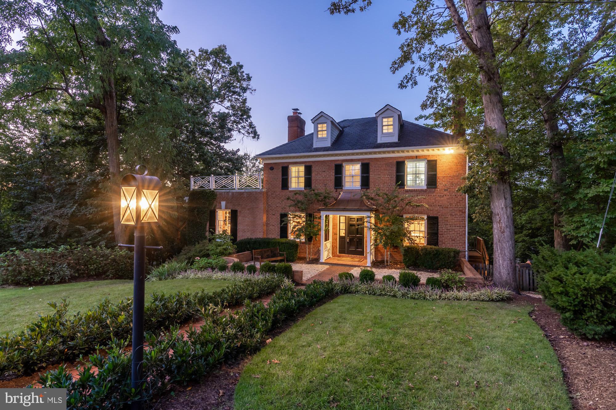 Presenting an updated 1953 classic brick Colonial sited in a quiet enclave of luxury residences. Located on a cul-de-sac this comfortable home offers spacious room sizes, elegant design and a versatile updated floor plan.   Enter through the foyer to access the main level living areas and staircase to the upper level. The first floor includes a gracious Great Room with wood burning fireplace, unique and updated light fixtures and attractive crown molding. There is a formal dining room with a gleaming chandelier, built-in cabinetry and elegant moldings. Additional spaces on this level include an updated and spacious kitchen with adjacent dining area, private screened porch and convenient powder room. This updated kitchen features quartz counter tops, stainless steel appliances including a six burner Commercial Viking stove with separate grill, abundant white cabinetry and counter space. Gleaming hardwood flooring on the main level, handsome built-ins and recessed lighting combine to create a welcoming atmosphere. Upstairs you will find three large bedrooms plus two updated bathrooms- ensuite is the Primary Bedroom. Graciously outfitted with plantation shutters, abundant closet space and hardwood floors, the bedrooms provide plenty of space for comfort.  Additionally there is a third level finished space with updated full bathroom- perfect for an office, playroom or overflow bedroom space. Completing the home is a functional and beautiful finished lower level recreation room with fireplace and attractive sconces and recessed lighting, two additional bedrooms with two more updated full bathrooms, an exercise/ play room and a pristine laundry area. Lots of work at home spaces!!! Walk out from this level to the covered rocking chair porch and further outdoors to the rear stone patio with lush plantings. With two levels of terraced flat back yard there's room for great entertaining! Welcome to everything the Belle Haven neighborhood has to offer including a nearby marina, Country Club, bike path, access to the scenic Potomac River waterfront and the many shops and restaurants of Old Town Alexandria