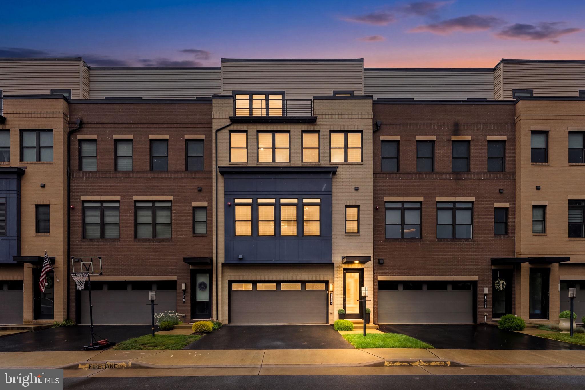 ** OPEN SATURDAY 6/20 2-4 PM ** OUTSTANDING 4-LEVEL CONTEMPORARY LUXURY TOWNHOME offering 3,400 square feet of beautifully upgraded living space ** Neutral designer paint throughout ** This exceptional home features a ROOFTOP TERRACE, Trex deck, and fenced backyard with a stunning professionally installed paver patio **

** TOP RATED SCHOOLS CLOSE BY ** 

** Boasting 3 bedrooms, 3 full bathrooms, and 2 powder rooms, the home showcases upgraded wide-plank hardwood floors throughout, staircases with contemporary iron railings, and designer finishes at every turn ** Upper-level laundry room with BRAND NEW LG WASHER AND DRYER **

** The gorgeous GOURMENT KITCHEN with upgraded cabinets, granite counters and backsplash, large pantry and broom closet - includes an OVERSIZED ISLAND with pendant lighting and bar seating - opening to the spacious LIVING ROOM with a linear gas fireplace and access to the private Trex deck backing to mature trees ** The DINING ROOM features transom windows and a custom chandelier, creating an elegant entertaining space ** POWDER ROOM with designer sink vanity and hardware **

** The upper-level LOFT with powder room opens directly to the ROOFTOP TERRACE, while the lower-level flex room with full bath provides the perfect space for guests, a home office, or gym, with access to both the oversized finished garage and FENCED BACKYARD with paver patio **

** Step outside to enjoy a beautiful COMMUNITY PARK with gazebo and direct access to Brambleton’s walking and jogging trails **

** Enjoy 5-star amenities and services included with the HOA, and available to Brambleton residents; multiple pools, sports courts, 18 miles of paved trails, dog park, weekly farmers markets, FIOS highspeed internet, cable TV, lawn service and trash removal **

** EASY ACCESS TO; Brambleton Town Center with state-of-the-art library, restaurants, movie-theater and shopping.  COMMUTERS will love the easy access to major highways, Dulles Toll Road, Dulles Airport, and the Silver Line Metro **