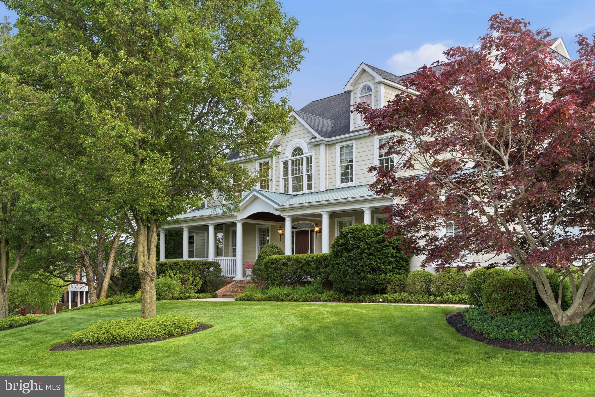 Set on a picturesque 1.126 acres, this custom-built home in the MANOR OAKS/BRIAR KNOLL Community is masterclass in craftmanship, architectural detail and refined luxury.  The large Southern-style front porch greets you as you step into the grand two-story foyer with sweeping staircase and impeccable millwork.  Flanked on both sides of the foyer are a formal dining room and formal living room, featuring Southern-style shutters, nine-foot ceilings, and hardwood flooring. 

At the heart of the home is the gourmet kitchen designed for both entertaining and functionality, featuring a large central island with a cooktop and indoor grill, vegetable prep sink, and warming drawer.  Custom cabinetry with practical storage and glass-front display cabinets surrounds throughout, as well as Italian tile flooring.  The kitchen features a breakfast room with a gas fireplace, a bar with a wine refrigerator and wine rack, a walk-in pantry, and a dedicated desk area with an abundance of cabinet space.

The great room is a showpiece highlighted by soaring two-story ceilings, a Juliet balcony overlook, dramatic coffered ceiling, and expansive windows that flood the space with natural light.  The wood-burning fireplace with custom raised-hearth and mantle creates both warmth and visual impact.  

The main level also features a large office with hardwood flooring, a laundry room with utility sink, and the primary suite with cathedral ceilings and a gas fireplace with custom mantle.  The spa-like master bath is exquisitely appointed with upgraded tile, heated floors, a jetted two-person bathtub, and a fully customized steam shower complete with dual shower heads, integrated bench seating, and full-body water jets, delivering a true at-home spa experience.  Dual walk-in closets and thoughtfully designed display shelving complete the suite, while French doors open to a private balcony for seamless indoor-outdoor living.

The upper level can be accessed by either the front or back staircase, and includes four generously sized bedrooms, large walk-in closets and three well-appointed full baths, as well as a large versatile bonus room above the garage. 

Outdoor living is equally exceptional with three covered porches, a bluestone patio off the great room, and beautifully landscaped grounds featuring mature trees and exceptional privacy.  The large rear yard is fully fenced and a storm door off the kitchen to the back yard has a built-in dog door.  The yard was also designed to include plenty of space for a future inground pool.


Additional highlights include a three-car garage with additional storage, a lower level with double walk-out doors and windows and plenty of expansion potential, a first floor powder room, Anderson windows and doors, dual-zone heating and cooling, propane cooktop and indoor grill, a Rheem Marathon electric water heater ensuring uninterrupted hot water, fully owned 1,000-gallon underground propane tank, and a whole-house water filtration and pH balancing system. 

Lovingly maintained by the origonal owners, this is a rare offering where thoughtful design, premium materials, and timeless elegance converge – delivering a truly exceptional living experience in one of Baltimore County’s most sought-after locations.