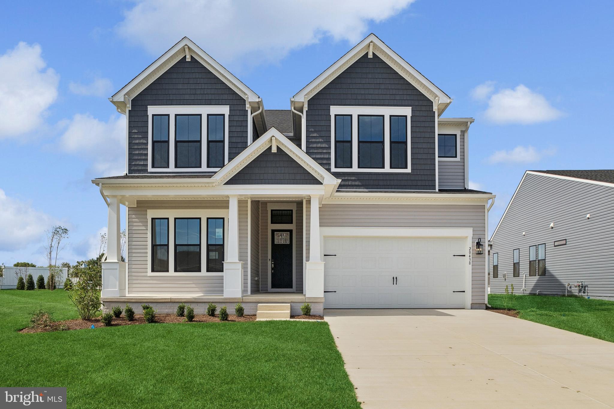 Welcome to the Tuscaloosa, a spacious and thoughtfully designed home offering 5 bedrooms, 4.5 baths, and a 3-car garage. Scheduled for settlement in July 2026, this home delivers the perfect combination of comfort, functionality, and modern design.

The main living area features a cozy fireplace with mantel and hearth, creating a warm focal point for gathering. A dedicated home office provides a quiet and productive workspace, while the screened patio extends the living area outdoors—perfect for relaxing or entertaining. Practical touches such as a utility sink add convenience to everyday living.

The kitchen is designed for both style and performance, featuring a single oven, microwave, gas cooktop with range hood, dishwasher, French door refrigerator, pendant lighting, tile backsplash, and quartz countertops. Quartz countertops are also featured in the primary bath for a cohesive and elegant finish.

Luxury vinyl plank flooring runs throughout the foyer, extended foyer, HovHall, kitchen, dining area, great room, home office, extra suite, primary suite, and loft. Tile flooring is featured in the full baths and laundry room, while carpet provides comfort in bedrooms 3, 4, and 5.

The primary bath offers a spa-like retreat with a freestanding tub, a walk-in shower with seat and handheld shower wand, and a double-sink vanity.

For a full list of features for this home please contact our sales representatives. 
Photos are for illustrative purposes only and may not represent the exact home or finishes available.

Welcome to a new luxury active adult 55+ community on Maryland's Chesapeake Bay. Discover the amenity-filled, resort-style experience within 45 miles of Washington DC and Baltimore. Residents can take advantage of the community's 24,000 sq. ft. clubhouse with indoor & outdoor pools, a state-of-the-art fitness center, and multiple tennis and pickleball courts. With a full-time lifestyle director on site the community also features a well-maintained calendar of activities such as walking club, indoor and outdoor yoga sessions, mahjong club, kayaking, pickleball and more. Kent Island life is about making friends and enjoying the company of people who have worked hard and now want to enjoy all that a luxury 55+ community has to offer. Located steps from the water and minutes from Annapolis, the location also offers quick access to Rt. 50. Enjoy the convenience of nearby dining and shopping options together with the quaint charm of a small town.