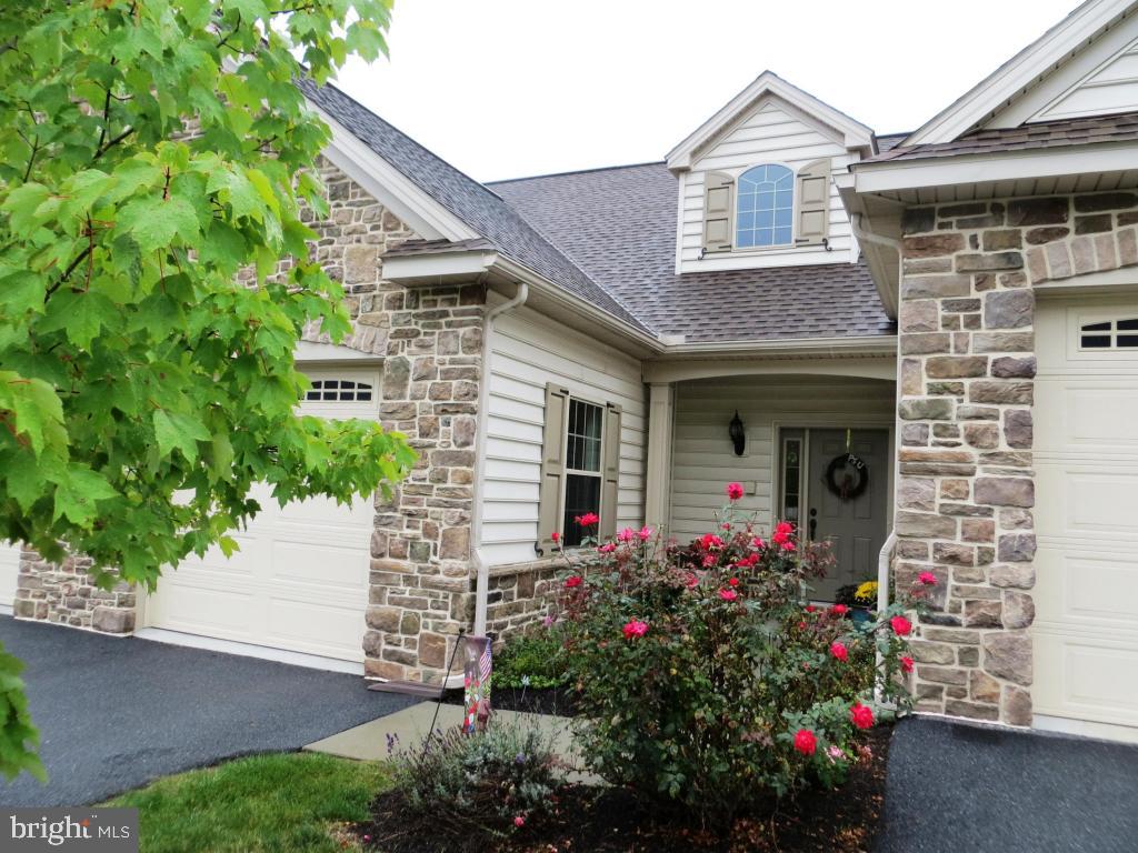 Live trouble free in this beautiful home with a first floor Owners bedroom and bath w/double closets. Two bedrooms a bath and an open loft on the second floor. Vaulted ceilings, open kitchen , dining and living room areas make this easy living at it's best. You'll enjoy the care free lifestyle this home offers.