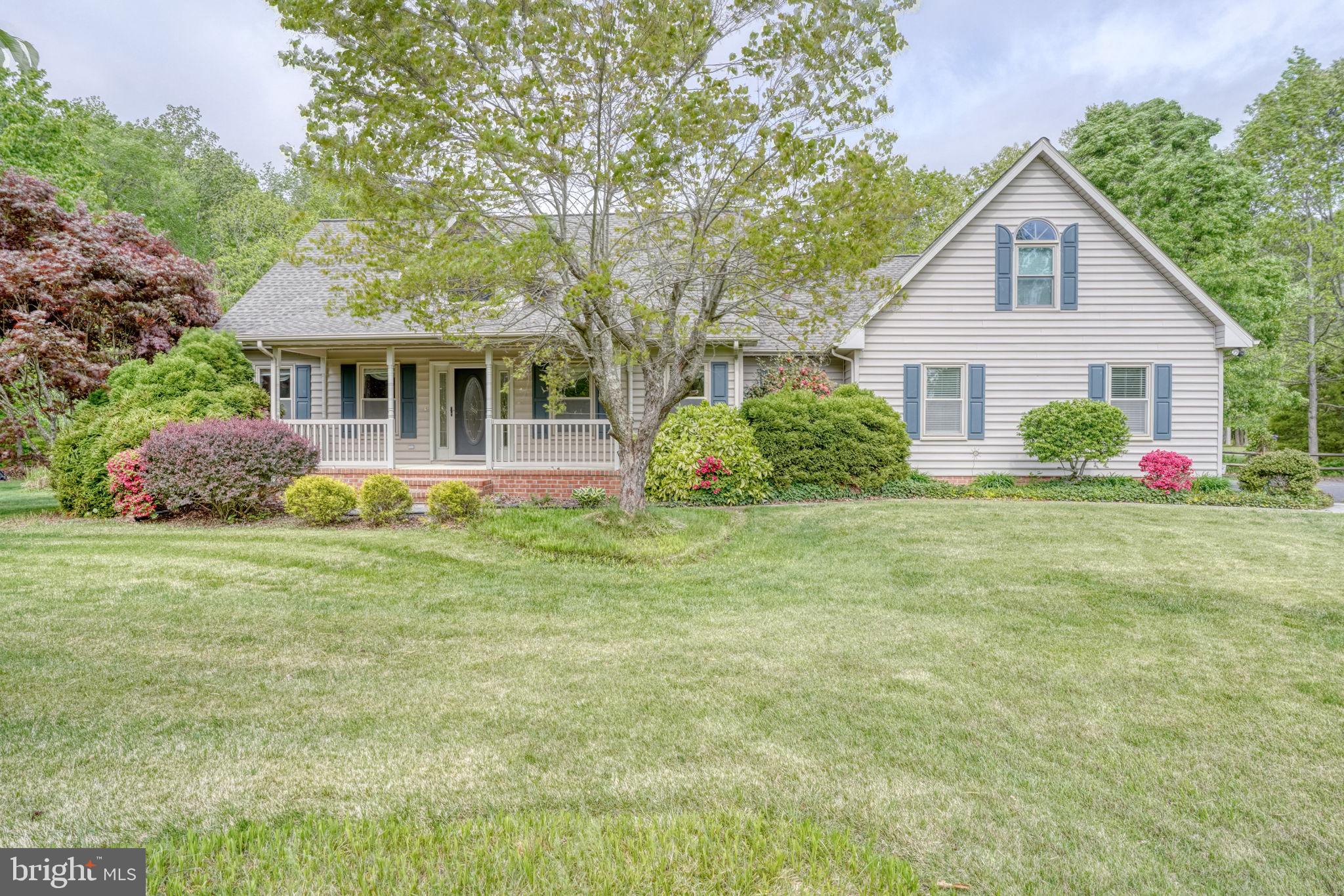 8780 Marsh View presents a custom-built, one-owner home set on just over 4 acres with water views of the Choptank River in the desirable High Banks community. The beautifully landscaped grounds create a private, garden-like setting perfect for peaceful living and outdoor enjoyment.

The property features a spacious carriage house with electric, ideal for storage, a workshop, or hobby space. Two gazebos—one on the oversized deck and another nestled in the yard—offer inviting spots to relax, entertain, and enjoy evenings or weekend crab feasts.

Inside, the open floor plan is designed for both everyday living and entertaining. The first-floor primary suite includes a walk-in closet and a luxurious en-suite bath with a walk-in shower, soaking tub, and heated floors. The large kitchen is well-equipped with essential appliances, including a wall oven, and features a generous island with bar seating, granite countertops, and a tile backsplash.

The home also offers a spacious family room with vaulted ceilings, a separate den or office, and a formal dining room. Upstairs, a finished bonus room provides flexible living space, along with additional access points for ample storage.