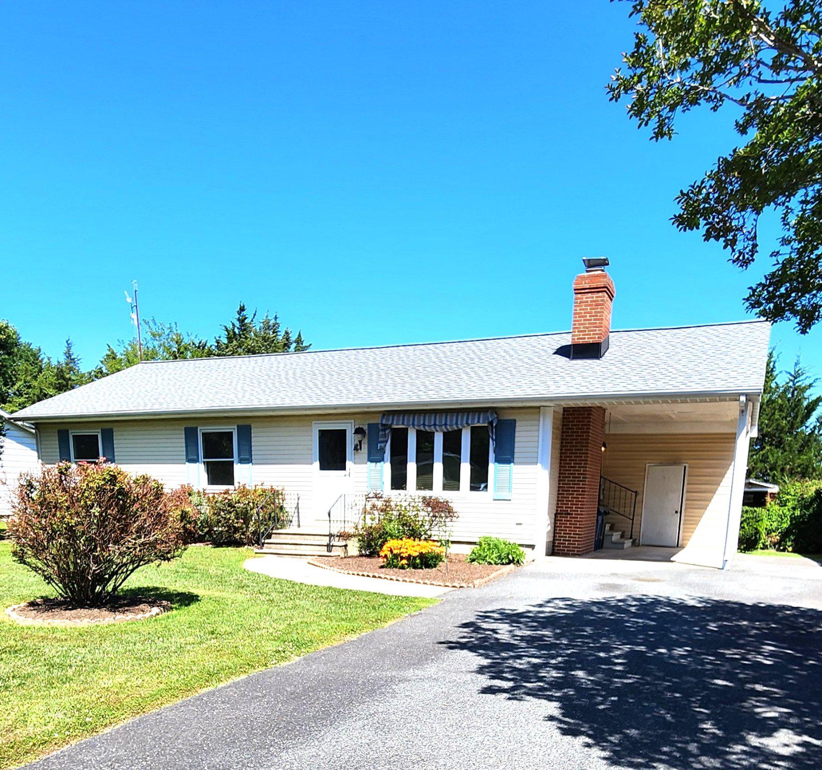 This charming ranch-style home in the Fausley subdivision offers a perfect blend of comfort and functionality. Built in 1983, this detached residence features a traditional floor plan with 1,246 sq. ft. of well-utilized space, ideal for modern living. The interior boasts three spacious bedrooms and two full bathrooms, and a four season sunroom providing ample room for relaxation and privacy. The inviting living area is enhanced by a cozy gas fireplace, perfect for creating a warm ambiance during cooler months. The kitchen is equipped with essential appliances, including a new electric oven/range, new range hood refrigerator, and a dishwasher, making meal preparation a breeze. A convenient laundry area includes a washer and electric dryer, adding to the home's practicality. Outside, the property is adorned with low-maintenance vinyl siding and features a 0.17-acre lot, complete with a shed for additional storage. Enjoy the outdoors, take advantage of the attached carport and paved driveway for easy parking. The neighborhood is well-lit with street lights, enhancing safety and accessibility. This home is not just a residence; it's a lifestyle choice that combines comfort, convenience, and community. Don't miss the opportunity to make this delightful property your own!