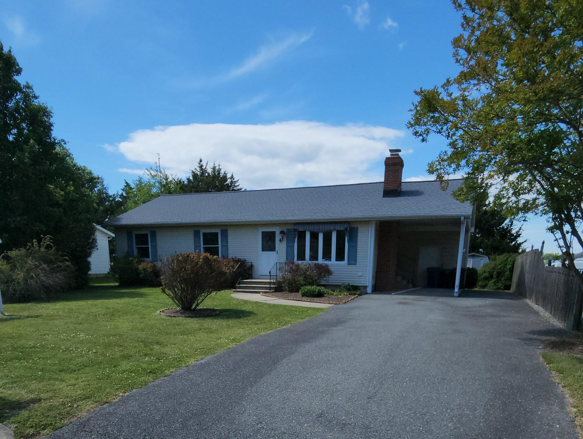 This charming ranch-style home in the Fausley subdivision offers a perfect blend of comfort and functionality. Built in 1983, this detached residence features a traditional floor plan with 1,246 sq. ft. of well-utilized space, ideal for modern living. The interior boasts three spacious bedrooms and two full bathrooms, and a four season sunroom providing ample room for relaxation and privacy. The inviting living area is enhanced by a cozy gas fireplace, perfect for creating a warm ambiance during cooler months. The kitchen is equipped with essential appliances, including a new electric oven/range, new range hood refrigerator, and a dishwasher, making meal preparation a breeze. A convenient laundry area includes a washer and electric dryer, adding to the home's practicality. Outside, the property is adorned with low-maintenance vinyl siding and features a 0.17-acre lot, complete with a shed for additional storage. Enjoy the outdoors, take advantage of the attached carport and paved driveway for easy parking. The neighborhood is well-lit with street lights, enhancing safety and accessibility. This home is not just a residence; it's a lifestyle choice that combines comfort, convenience, and community. Don't miss the opportunity to make this delightful property your own!