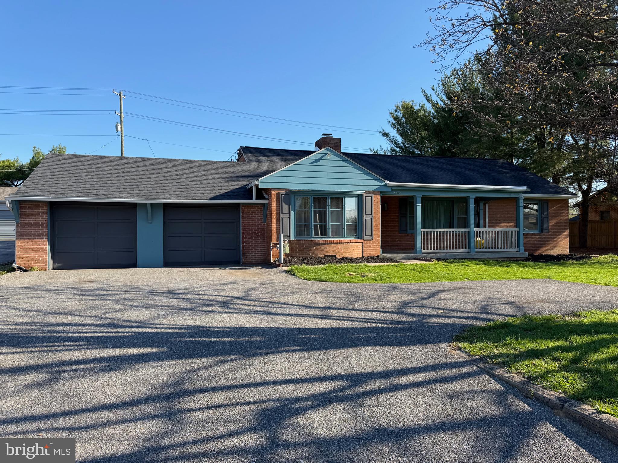 Renovated brick rancher located on Longmeadow Road! This home features a two-car garage, central heating and cooling, and a spacious level backyard, perfect for outdoor enjoyment. Inside, you’ll find a bright and inviting family room with a large picture window and a brick fireplace. The adjacent kitchen offers beautiful countertops, updated appliances, and convenient access to the patio and backyard, ideal for entertaining. A separate laundry room adds to the home’s functionality. The primary suite includes a full bathroom and a walk-in closet, while two additional bedrooms and another full bath complete the layout.  Conveniently located near I-81 and I-70, as well as shopping, dining, grocery stores, and schools. Schedule your tour today!