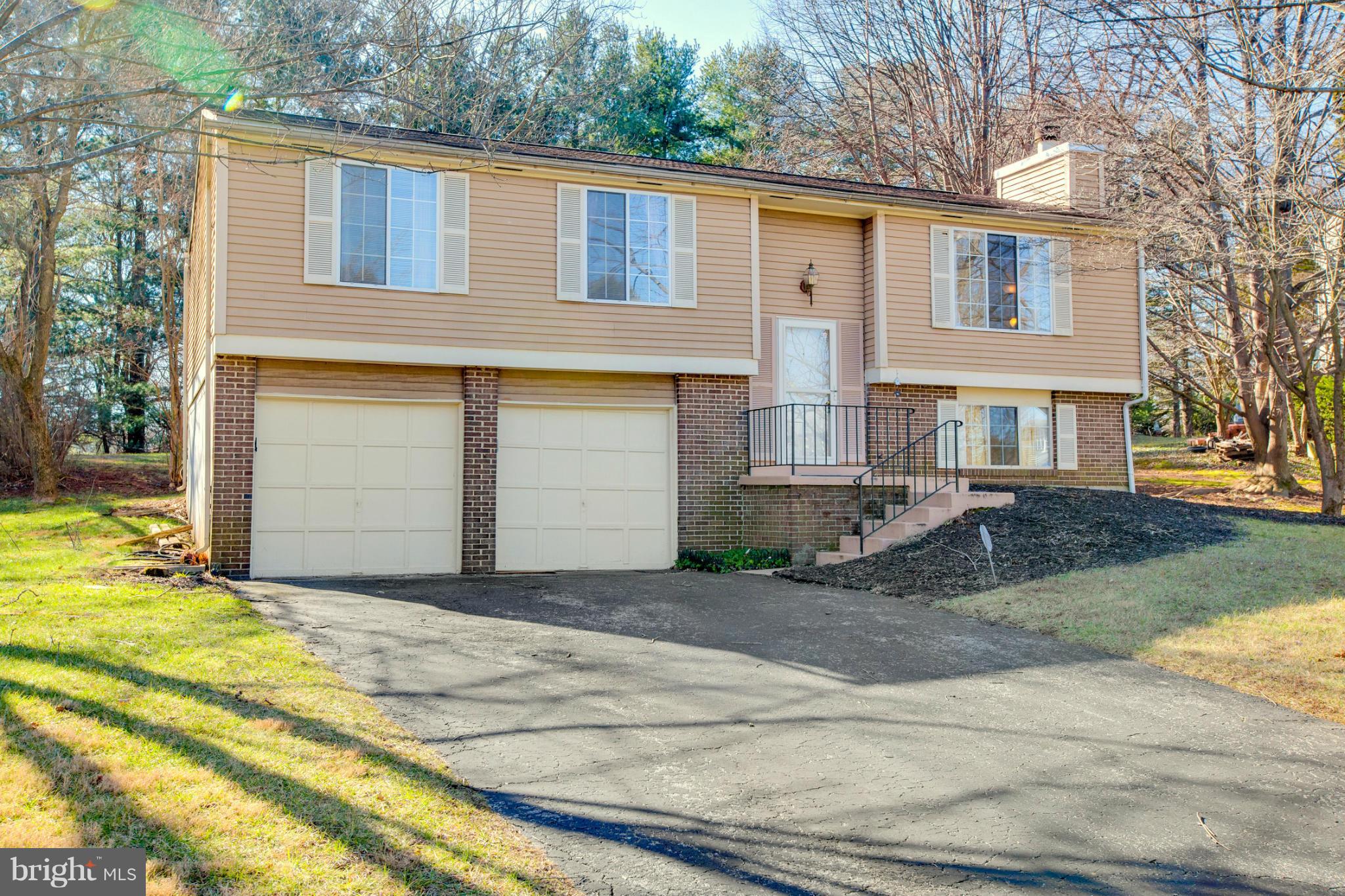 CHARMING SPLIT LEVEL SINGLE FAMILY HOME IN SOUGHT AFTER BURLEIGH MANOR... PRIME LOCATION W/TOP RATED CENTENNIAL SCHOOLS!!! FEATURES INCLUDE 3BDRMS/2.5 BATHS, 2 CAR GARAGE, LARGE KITCHEN W/NEW APPLIANCES, FRESH PAINT, SPACIOUS MAIN LVL W/LOTS OF NATURAL LIGHT, SLIDING DOOR TO DECK, LOWER LEVEL REC RM W/FIREPLACE & LAUNDRY ROOM, LARGE LOT BACKING TO WOODS*EASY COMMUTE TO BALT/D.C./NSA/FT.MEADE