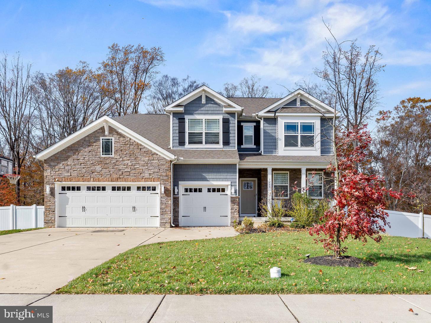 Perfect for generation living with at least 1 full bath on every level. Don't think new until you tour this stunner, just under 4 years old !  6 Bedrooms ! This home  has all the bells and whistles!  This home has over  5,500 sq. ft  of finished living space.  3 Car garage  what a dream home!  Even back to a wooded area. 
This stunning two-story residence features six bedrooms, four bathrooms, butlers pantry,  a loft, sunroom, office, and a three-car garage and completely finished lower level.
The foyer invites you past the formal living room and coat closet, leading into the heart of the home — a well-designed kitchen showcasing a large island, abundant classic white cabinetry, stainless steel appliances, and a walk-in pantry and butlers pantry. The kitchen flows seamlessly into the informal dining area, sunroom, and great room, perfect for entertaining or relaxing.
A spacious secondary bedroom with a large closet and a full bathroom is conveniently located down the hall from the great room — ideal for guests or multi-generational living. For added convenience, a second coat closet sits in the mudroom  at the entrance to the three-car garage.
Upstairs, a large loft area provides flexible living space alongside four additional bedrooms. The owner’s suite is a luxurious retreat, featuring two expansive walk-in closets, a double-bowl vanity, a soaking tub, and a luxury walk-in shower. The laundry room is located on the upper level for convenience, along with another full bathroom complete with a linen closet and double-bowl vanity.
The finished lower level offers even more living space, including a recreation room, an additional bedroom and full bathroom, plus a spacious office area and a walk-out exit door.
Step outside and relax in your fully fenced backyard, featuring a two-tier composite deck and a patio area — perfect for entertaining or enjoying peaceful evenings outdoors. 
This home truly has all the bells and whistles. — Full yard irrigation system, remote blinds,  beautifully design, meticulously maintained, and move-in ready!