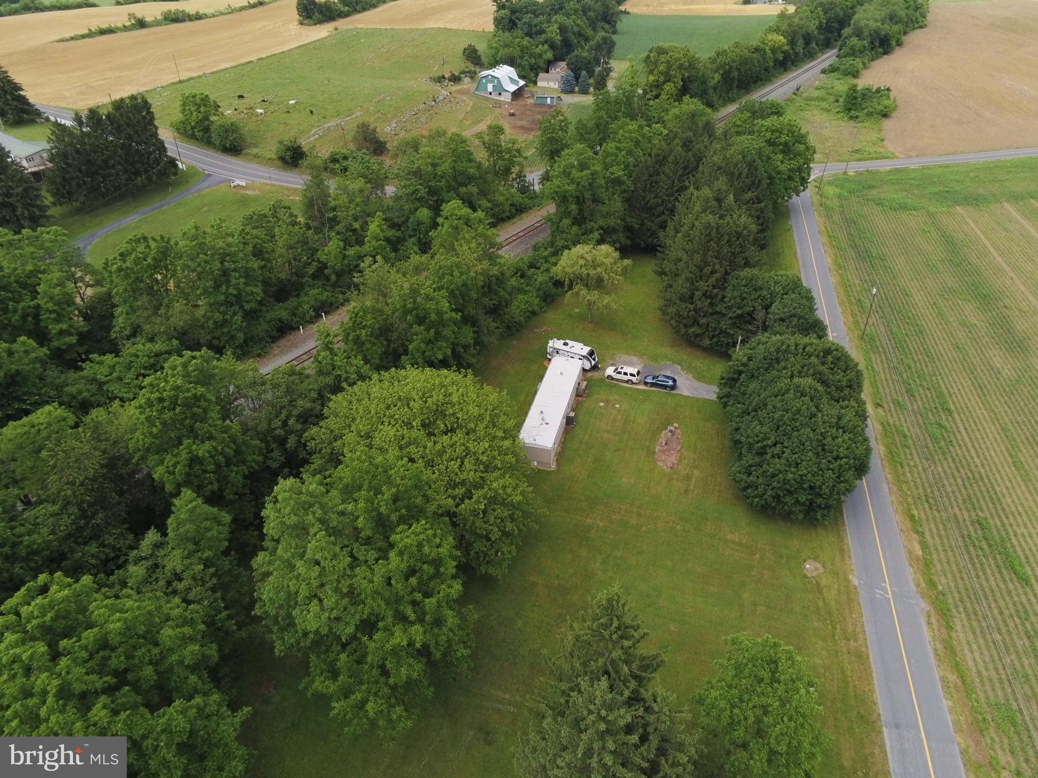 THIS IS COUNTRY!  Single wide mobile home on sprawling 4 acre country lot.  Well & septic.  North of Scotland.  Say goodbye to neighbors.  Easy I-81 access with long frontage backs to railroad.