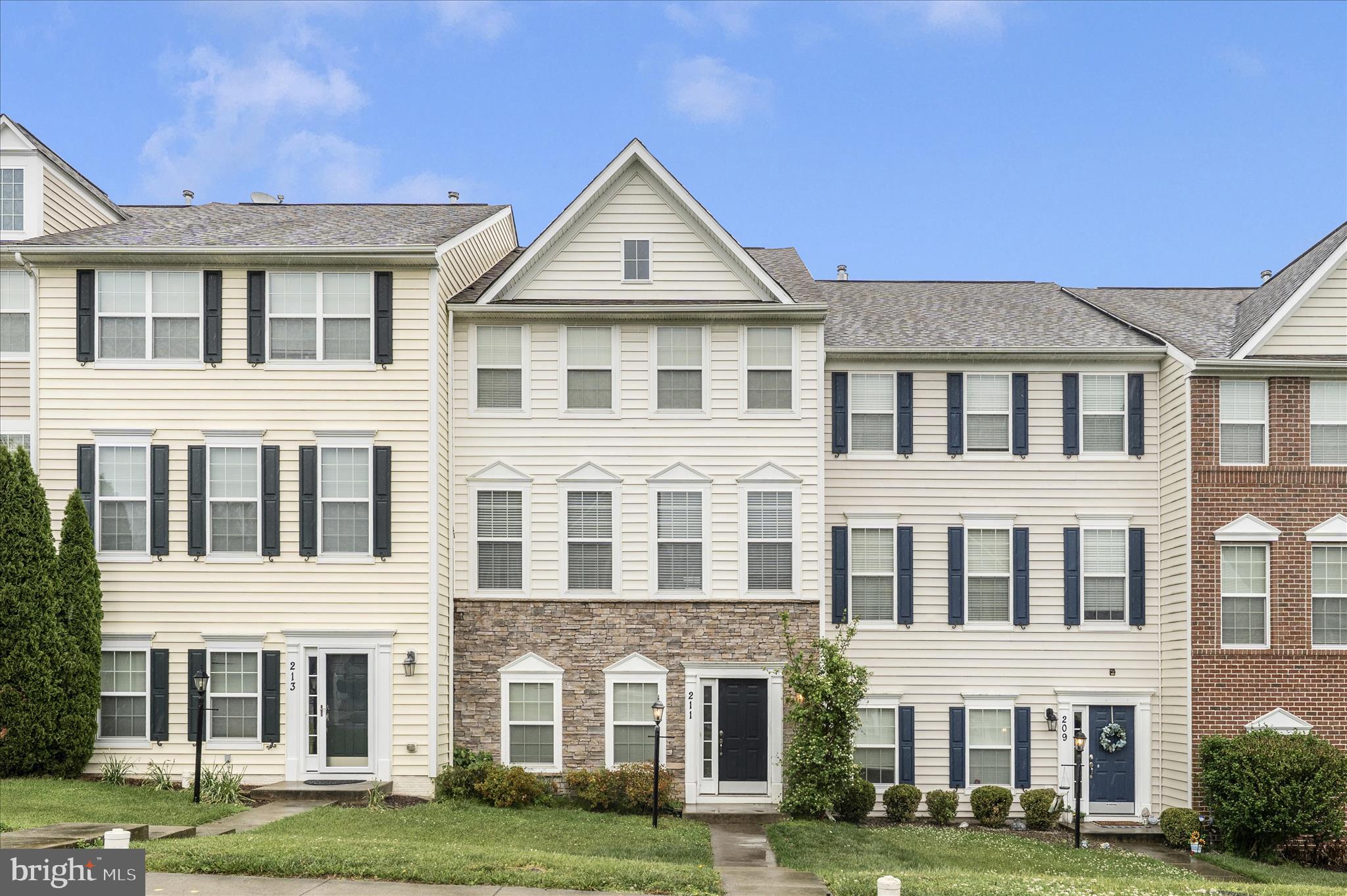 Spacious and beautifully designed, this 3-level townhome offers over 2,200 square feet of comfortable living space in the highly desirable Brinkley Manor community of New Market. Featuring 4 bedrooms, 3 full baths, and 1 half bath, this home combines functionality, space, and convenience in a prime commuter-friendly location. The main living area offers an open and inviting layout with abundant natural light, a cozy fireplace, and plenty of room for entertaining or everyday living. The spacious kitchen includes gas cooking, ample cabinetry, and flows seamlessly to the elevated deck above the rear-entry two car garage. Enjoy peaceful views overlooking a wide open grassy community area, creating the perfect setting for morning coffee, evening relaxation, or outdoor entertaining. The versatile floor plan provides flexible living options with generously sized bedrooms, multiple living levels, and plenty of space for guests, home office needs, or multi-generational living. While the home has been well maintained, some cosmetic updates including carpet replacement may be desired, providing an excellent opportunity for buyers to add their own personal touches and build instant equity. Located in the sought-after Brinkley Manor/Lake Linganore area, residents enjoy nearby walking paths, playgrounds, shopping, dining, and convenient access to commuter routes.