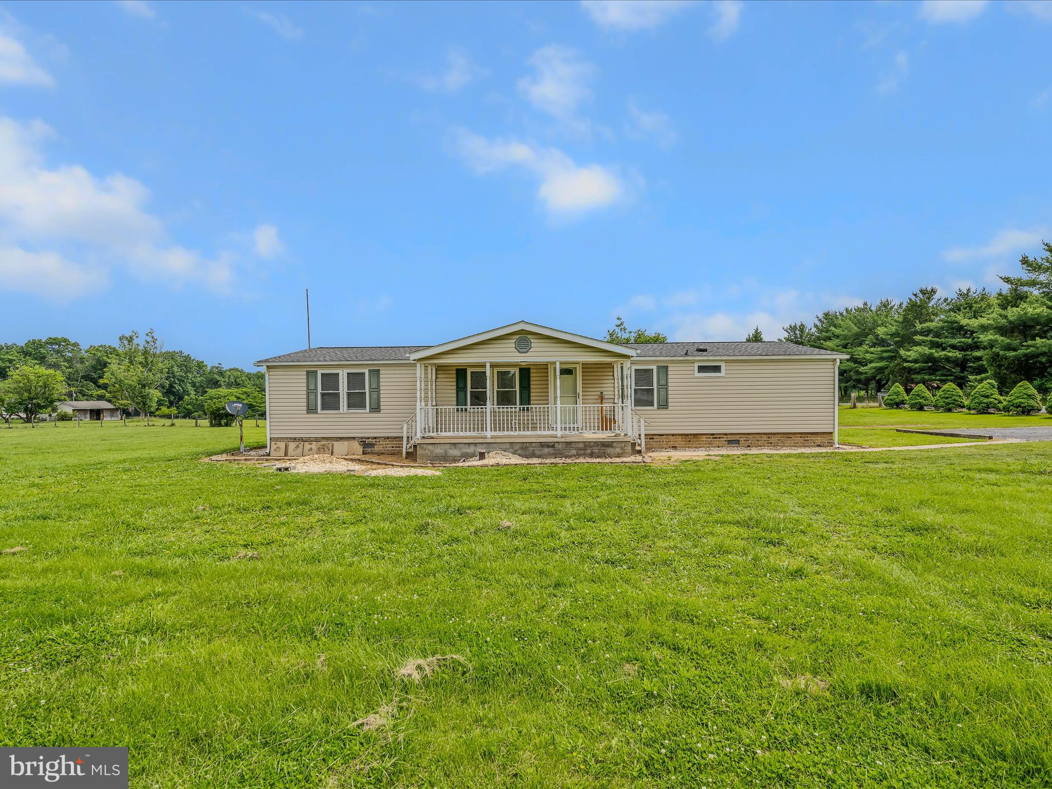 Enjoy the best of country living with this well-maintained single level living 1,680 sq ft home featuring 3 bedrooms, 2 bathrooms, a spacious floor plan, and no HOA. Set on a private 2.10-acre unrestricted lot, this property offers flexibility for gardening, animals, RVs, or future additions. Relax on the patio or take advantage of the storage shed for tools and equipment. Conveniently located near town, shopping, and commuter routes. Move-in ready and full of potential— call to schedule your tour today!