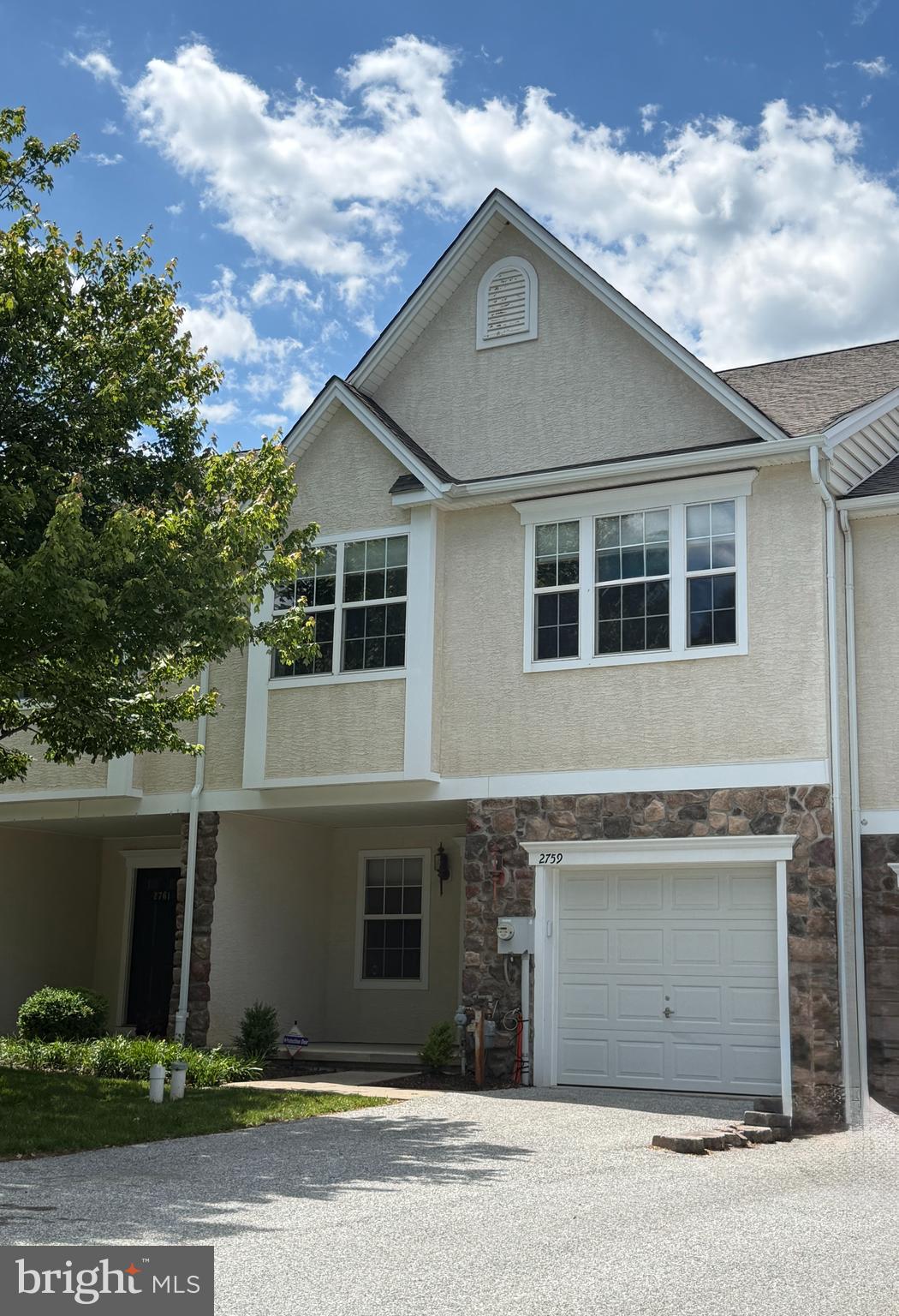 Welcome home to this beautifully updated and truly move-in ready town home located in the community of The Mews at Bailey Station. Offering over 2,000 square feet of freshly painted finished living space, this home features a one car garage with new garage door opener, built in shelves and  EV wired, two bedrooms, 2 baths, and a fully finished daylight lower level. Thoughtful updates combine comfort, functionality, and style. There is nothing to do but unpack! The open, light-filled upper main level offers a seamless flow for everyday living and entertaining. The open floor plan features a spacious dining room with tasteful lighting package, wainscoting and crown molding throughout. The living room is also just off the kitchen with additional recessed lighting and ceiling fan. Living room opens to the maintenance free Trex decking with vinyl rails. Relax and be comfortable for morning coffee or just evening relaxation. The entire top floor offers upgraded hardwood plank flooring and fresh neutral paint. The sunny kitchen has been updated with newer top of the line Samsung black stainless steel appliances, double sink, island, gas cooking, new garbage disposal, built in microwave, bright cabinets and recessed lighting.  Upstairs, you will also find two spacious bedrooms with newer carpet, ceiling fans and recessed lighting. The primary bedroom offers shiplap walls and walk-in closets. The primary suite is bright and inviting and features a beautiful  bath with double vanity, stall shower and soaking tub.  The second bedroom is tastefully decorated with large closets and a second bathroom in the hall. Laundry is located on the lower level, with a washer and dryer included and new carpet. The finished daylight lower level offers outstanding flexibility and slider to quiet back yard. Lower level is ideal for a 3rd bedroom, second family room, home office, gym, or playroom. It features large closets, and tons of natural light.  The entrance is a large open foyer with new plank flooring that has the versatility to be used in a multitude of facets. Enjoy a lifestyle in this home that blends privacy and convenience. Just a short walk to shopping, trails and the Thorndale Train Station. Commuters will appreciate the easy access to I-76 and Routes 30, 202, 401 and train. Dining and shopping are nearby in Thorndale, Exton, West Chester, Phoenixville and KOP just 15–20 minutes away. This home offers the perfect balance of updated living space, sidewalks and sense of community that you won't want to miss along with low taxes, newer hot water heater and HVAC! This one shows with a true pride of ownership.