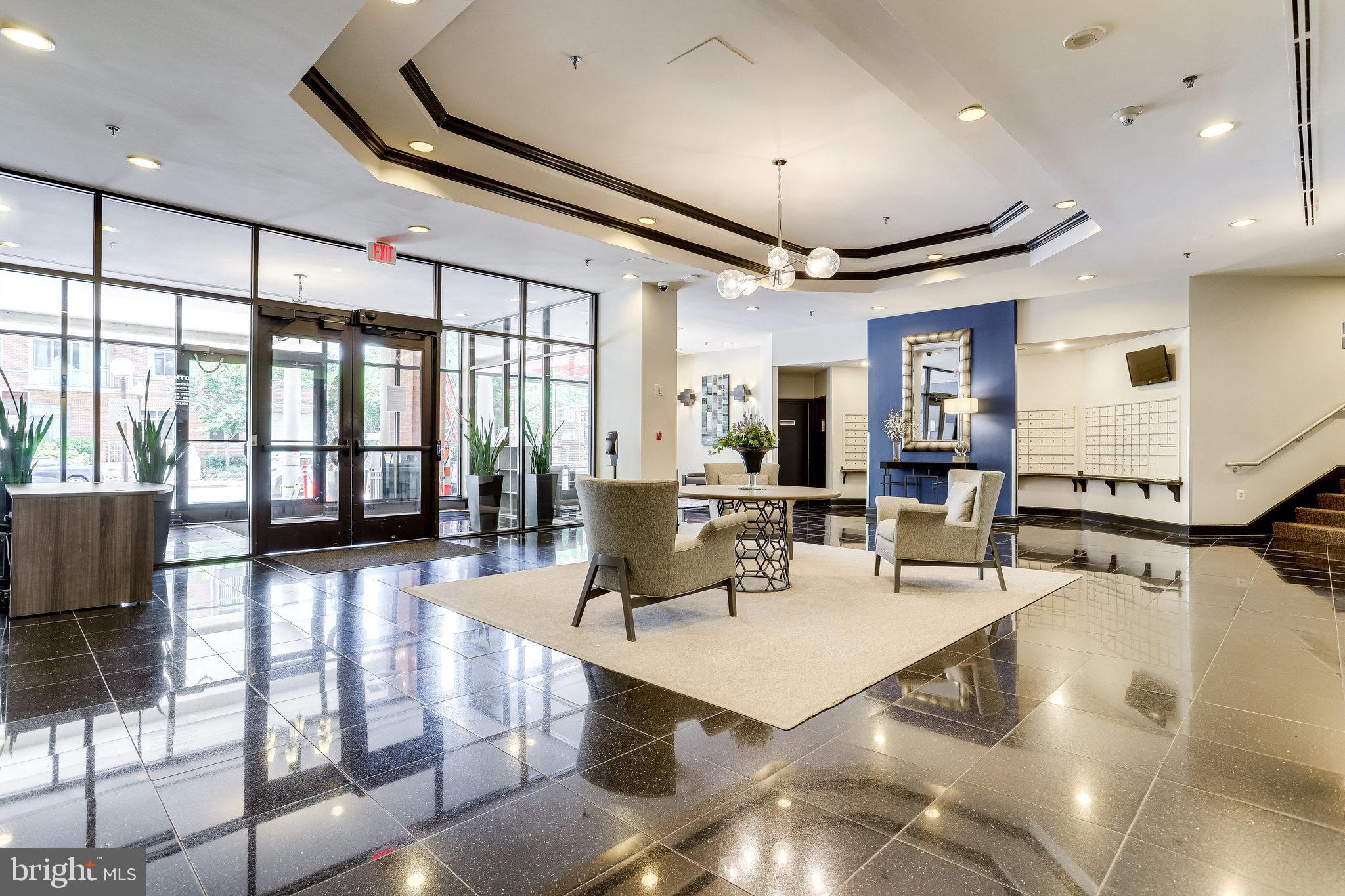 Modern comfort meets convenience in this stylish 1-bedroom, 1-bath condo! Clean with modern updates! Enjoy your own private balcony, as well as in-unit laundry and reserved covered parking. This well-maintained community also offers many amenities, including a pool, fitness center, and beautifully landscaped green space. Located in a highly walkable area, you're just steps from Quincy Park, many popular restaurants, cafes, and shops, making it easy to enjoy the neighborhood. Added bonus- the Ballston Metro Stop! A perfect blend of privacy, lifestyle, and location!
