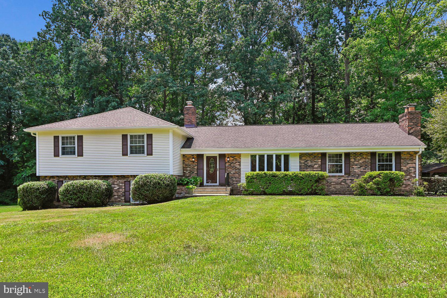 Welcome to one of the best values in highly sought-after Davidsonville! Nestled on a private 2.09-acre lot in the desirable Lake of the Pines community, this beautifully maintained 5 Bedroom, 3.5 Bath home offers over 3,200 square feet of living space designed for everyday comfort and unforgettable entertaining. From the moment you arrive, you'll appreciate the peaceful setting while still enjoying quick access to Route 50, making commuting to Annapolis, Washington, D.C., Baltimore, Fort Meade, and NSA a breeze.
The heart of the home is the gourmet Kitchen, completely remodeled in 2016 with granite countertops, custom cabinetry, stainless steel appliances, and abundant workspace. Rich hardwood floors flow throughout the main level, while two wood-burning fireplaces create warm and inviting gathering spaces for family and friends.
Step outside and discover your own private backyard retreat. The resurfaced in-ground pool (2023), expansive pool deck, Trex deck, and beautifully landscaped grounds create the perfect setting for summer barbecues, pool parties, or simply relaxing in your own backyard oasis. Surrounded by mature trees, this property offers the privacy you've been searching for without sacrificing convenience.
The versatile four-level split floor plan provides spacious bedrooms, multiple living areas, and exceptional flexibility for today's lifestyle. A side-load two-car garage and tremendous storage space add to the home's everyday functionality.
Major updates have already been completed, including a new roof in 2020 and a thoughtfully renovated Kitchen, allowing the next owner to move in with confidence. The only thing left to personalize are the bathrooms, offering the perfect opportunity to bring your own HGTV-inspired vision and instantly add equity while making the home uniquely yours.
If you've been waiting for a spacious home on acreage in one of Davidsonville's most desirable communities—with an incredible backyard, and endless potential to make it your own—this is the one you've been waiting for.