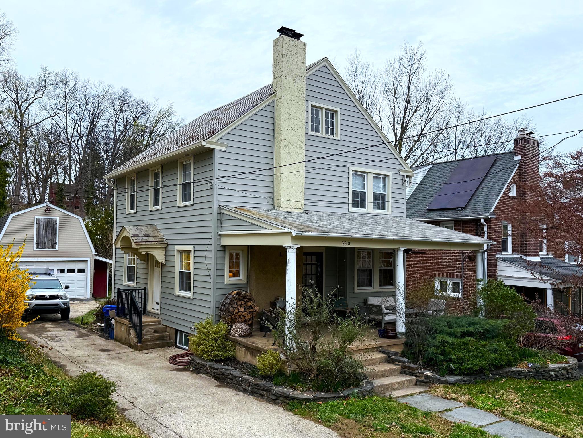 Welcome to this bright and friendly classic Glenside Colonial home with 3 bedrooms, 1.5 baths, and many bonus features. This home has been very well cared for and upgraded through the years, just waiting for the next owner’s personal touch. The first floor living room and dining room both lead into the large brand new  kitchen with recessed lighting, plenty of cabinets, stainless appliances, quartz counters, under cabinet lighting, and a mudroom overlooking private fenced rear yard with a patio for dining. Off of the kitchen in the mudroom there is the convenient first floor half bath. Upstairs there are 3 bedrooms, a full bathroom with new vanity and front loading built in laundry area. The attic is clean and open to be used as storage, a playroom, or a potential 4th bedroom. Downstairs is the fully finished and insulated basement with an included in wall wired home theater system and full perimeter drain system.  Out back is a large modern heated and air conditioned detached two car garage that can be used as a studio/office/shop workspace with stairs to a walk up second floor with plenty of storage. Live in comfort with a 3 zone high efficiency heating system with A/C, a high efficiency tankless water heater with a Pex manifold plumbing system, and a wood burning fireplace stove insert for those cold winter days.  Conveniently located close to parks, schools, shopping, transportation, library, restaurants and more. Make an offer today and make this beautiful home yours.  Owner is a licensed PA real estate agent.