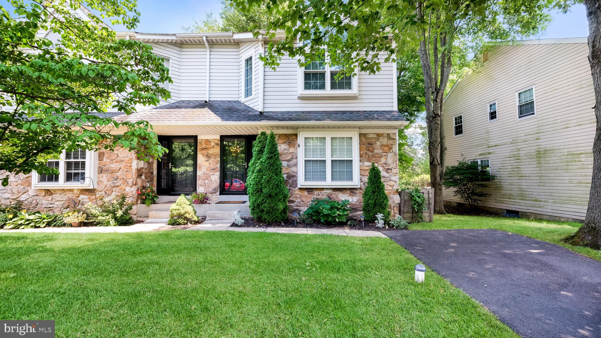 Welcome to this beautifully maintained 3-bedroom, 2½-bath twin nestled in the highly sought-after Sandy Ridge Twins community, just moments from the heart of Doylestown Borough and located within the award-winning Central Bucks School District. From the moment you arrive, you'll appreciate the attractive stone façade, mature landscaping, and inviting curb appeal. Step inside to discover gleaming hardwood floors, crown molding, recessed lighting, and abundant natural light that create a warm and welcoming atmosphere throughout the main level. The spacious living and dining rooms are ideal for everyday living and entertaining, while the well-appointed eat-in kitchen features rich cherry cabinetry extending to the ceiling, granite countertops, a subway tile backsplash, stainless steel appliances, and a sunny breakfast area. Sliding glass doors lead to a private deck overlooking a beautifully landscaped yard surrounded by mature trees, offering a peaceful setting for relaxing, entertaining, or enjoying your morning coffee.  The second level features a spacious primary suite showcasing a vaulted ceiling with a striking arched window, generous closet space, and a tastefully renovated en-suite bath with a beautifully tiled walk-in shower. Two additional generously sized bedrooms and an updated hall bath complete this level. The finished basement provides versatility, perfect for a family room, media room, home office, fitness area, or playroom, while the separate laundry room and dedicated storage/workshop offer added convenience and organization.  Enjoy the best of Bucks County living with boutique shopping, exceptional restaurants, museums, parks, walking trails, and year-round community events just moments from your doorstep. With easy access to major commuter routes, this move-in ready home offers the perfect blend of comfort, style, and an unbeatable location. Don't miss this exceptional opportunity to own a beautifully updated home in one of the area's most desirable communities, just moments from the heart of Doylestown Borough.