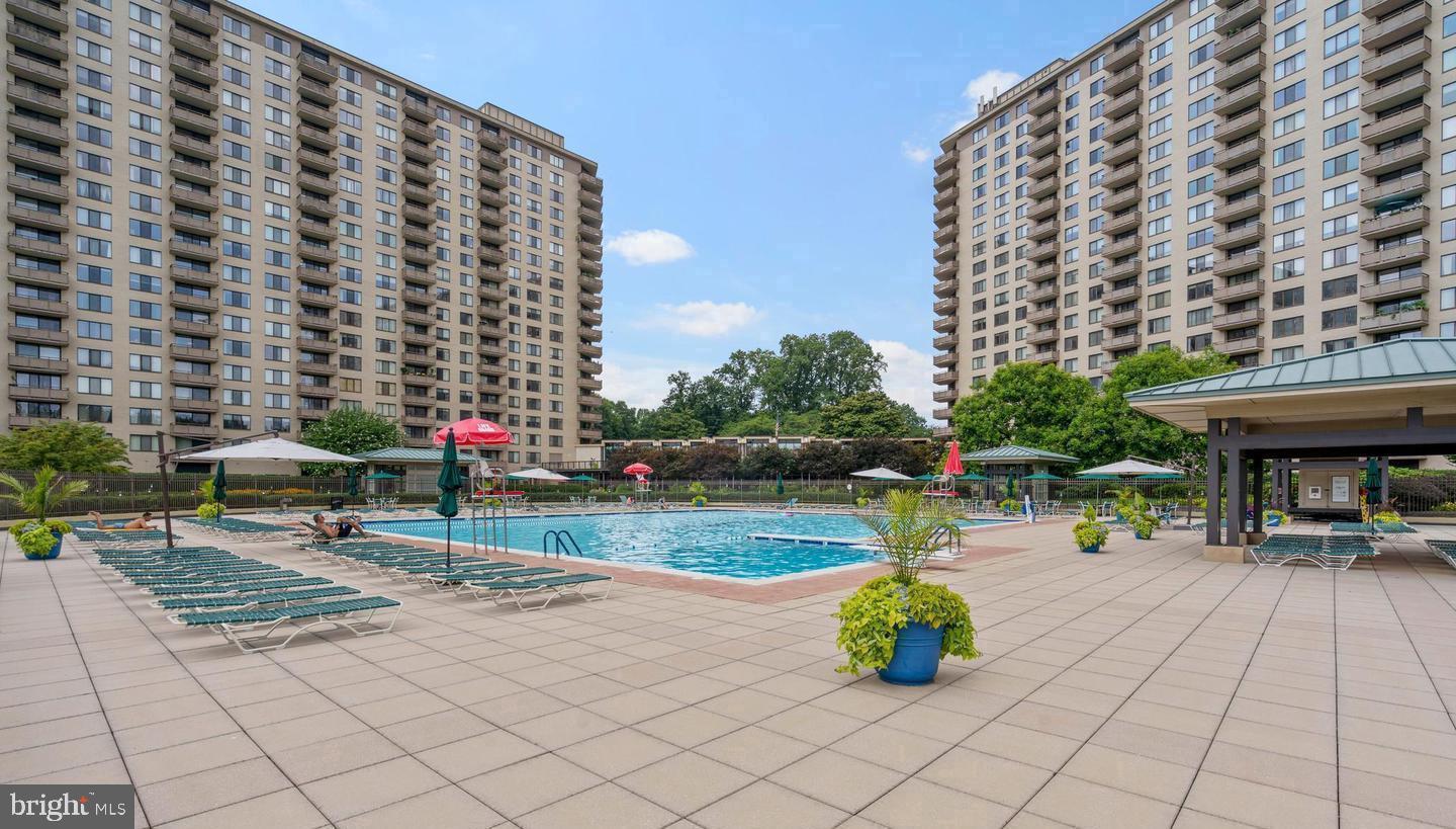 Welcome to The Promenade of Bethesda — one of Bethesda's most iconic luxury cooperative communities, set on 24 beautifully wooded and landscaped acres atop Pooks Hill Road in the heart of Bethesda.
This bright and well-appointed one-bedroom residence offers approximately 630 square feet of comfortable living space, featuring an open living and dining area, a spacious bedroom with a walk-in closet, an updated bathroom with a modern shower, and a renovated kitchen with contemporary finishes. A dedicated garage parking space is included.
Life here feels more like a resort than a residence. Amenities include an Olympic-sized outdoor pool and sundeck, a tennis club with 7 courts and a clubhouse, an indoor pool and fitness center, an on-site restaurant and bar, market and deli, salon, and dry cleaners. Residents can also enjoy fitness classes including yoga, Zumba, and dance, along with a sauna and whirlpool. The community atmosphere is further enriched with clubs, movie nights, holiday parties, EV charging stations, and a self-car wash station. A 24-hour front desk attendant and manned gatehouse provide security and peace of mind. 
The monthly co-op fee includes property taxes, utilities, cable, and all amenities — making this an exceptional value in one of Maryland's most desirable zip codes. 
Commuting is effortless, with fast access to I-270, I-495, and downtown Bethesda, plus a Ride-On bus stop right in front of the lobby for quick Metro access. Bike and walking trails connect directly to the Bethesda Trolley Trail, Rock Creek Park, and the Capital Crescent Trail. NIH, Walter Reed, Montgomery Mall, and Wildwood Shopping Center are all just minutes away.