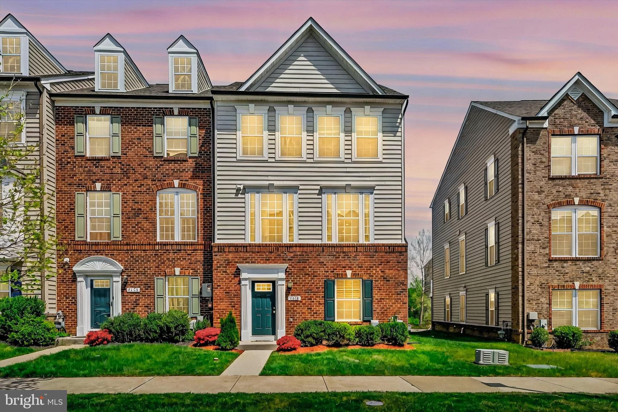 Introducing a remarkable end-unit 4-bedroom townhome nestled within the desirable Ballard Green community in Owings Mills. This residence offers a central location in Owings Mills, with convenient access to shopping and more. Positioned near the community center, residents enjoy easy access to amenities such as a gym, pool, and park, enhancing the overall quality of living.  

Step inside the Schubert's model to discover a layout that effortlessly combines comfort and elegance. The entry-level features a bedroom with an ensuite bathroom, ensuring privacy and convenience. The main level showcases a bright and spacious interior, highlighted by a modern kitchen boasting a large center island, granite countertops, and stainless steel appliances. The adjacent dining area seamlessly transitions to a deck, perfect for hosting gatherings or unwinding outdoors. 
Upstairs, three generously-sized bedrooms await, including the owner's suite with a sizable closet and a luxurious ensuite bathroom complete with a double sink vanity and soaking tub.  Additionally, a laundry room on this level adds practicality to this refined home.

Experience the harmonious blend of style and functionality in this inviting townhome. Schedule a viewing appointment today to envision a lifestyle of true sophistication and comfort...!!