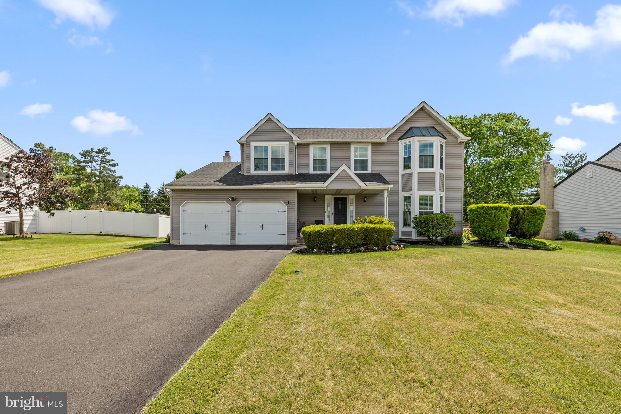 Welcome to this impeccably maintained and beautifully updated 4-bedroom, 2.5-bath Colonial nestled in a quiet, highly desirable Hatfield neighborhood within the award-winning North Penn School District. Offering the perfect blend of comfort, elegance, and convenience, this move-in ready home is just minutes from shopping, dining, parks, and major commuting routes. Step inside to a welcoming foyer flanked by a sun-filled formal living room featuring a charming bay window and a spacious formal dining room—perfect for entertaining family and friends. The heart of the home is the updated gourmet kitchen, complete with abundant cabinetry and a bright breakfast area. Brand-new French doors lead to a private two-tier deck overlooking the spacious fenced backyard, creating the ideal setting for outdoor dining, relaxation, and play. The kitchen flows seamlessly into the inviting family room, highlighted by a cozy gas fireplace. A convenient first-floor laundry room, powder room, and attached two-car garage complete the main level. Upstairs, you'll find a generously sized primary suite featuring a walk-in closet and a beautifully updated ensuite bath with double vanities, a soaking tub, and separate shower. Three additional spacious bedrooms and a well-appointed hall bath provide plenty of room for family, guests, or a home office. The full basement boasts tall ceilings and offers endless possibilities for future living space, a home gym, media room, or recreation area. What truly sets this home apart is the exceptional care it has received from its owners. Major systems have been routinely serviced and maintained, and every detail has been thoughtfully attended to in preparation for its next owners. Opportunities to purchase a home that has been loved and cared for this meticulously are rare. Simply unpack and enjoy everything this exceptional home has to offer!