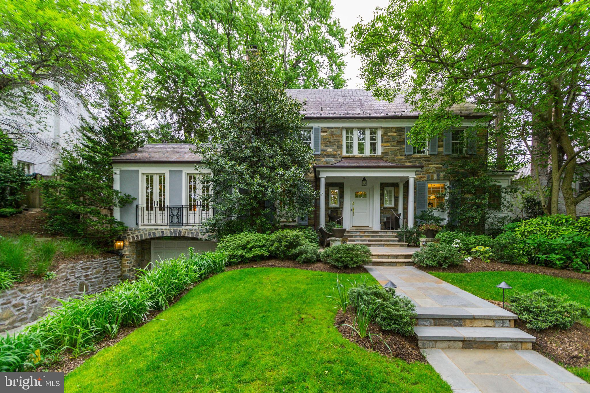 Beautiful Spring Valley home with POOL! Features 6BR/5.5BA with extraordinary finishes including hardwood floors, 4 fireplaces, crown moldings, and custom built-ins. This home has large entertaining rooms, Kitchen with Viking Oven/Stove and marble countertops, and a Sunroom on the main level. The Lower Level features a large Recreation Room, Bedroom, Full Bathroom, and Wine Room. The backyard features a SPECTACULAR POOL and  Pool House, Putting Green, and Patio perfect for entertaining! Additionally, there is a Driveway and oversized Garage.