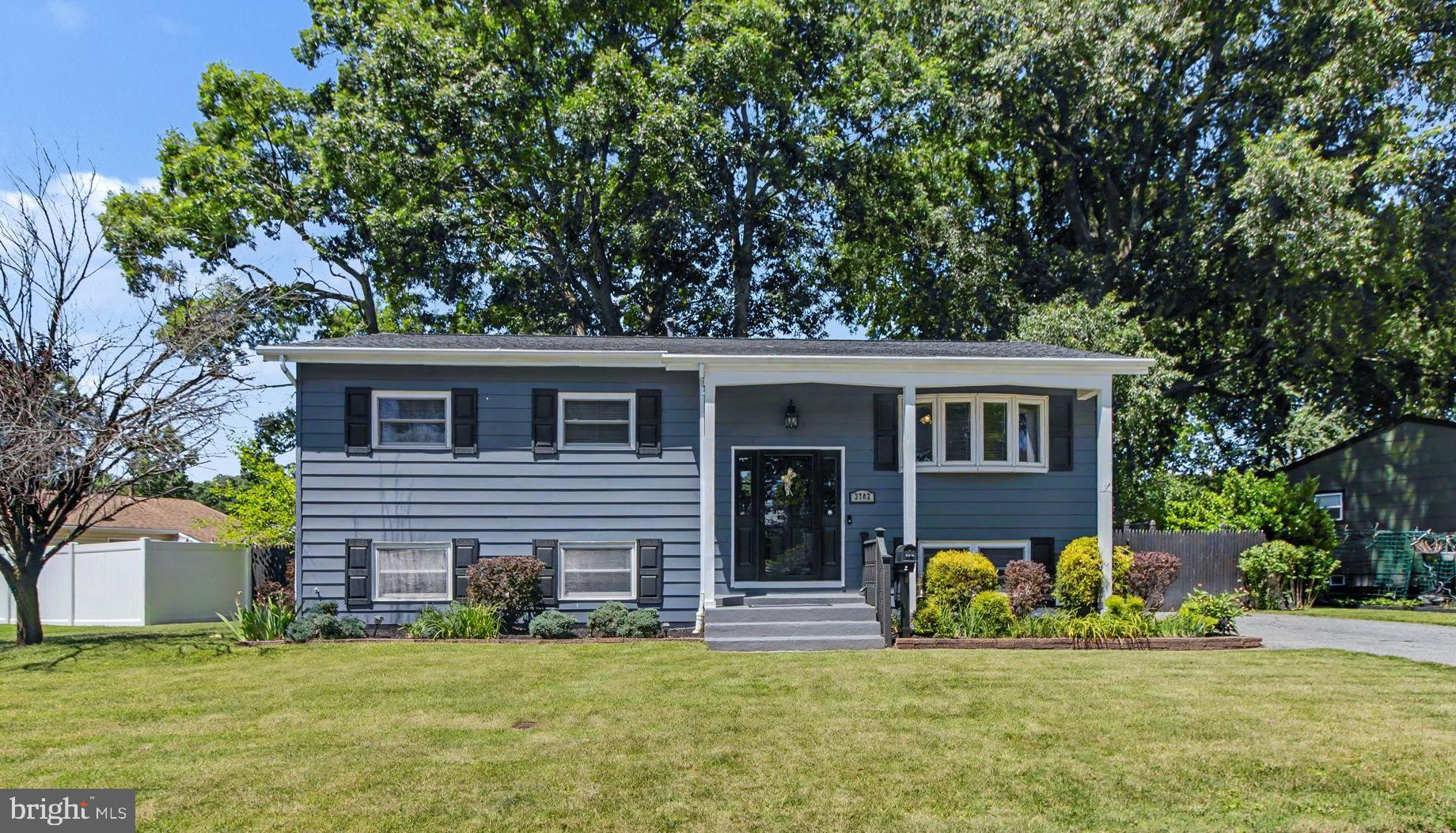 ** A Rare Find! ** Move right into this beautifully renovated 4-bedroom, 2-bath Carrollwood home, filled with contemporary flair and tasteful decorator touches throughout. Highlights include unique lighting, custom molding wall accents, and hardwood floors across the main level. The stunning renovated kitchen features 42-inch soft-close white cabinetry, granite countertops, stainless steel appliances, and a tile backsplash. The main level offers three bedrooms and an updated full bath with a tiled bath surround and modern fixtures. The finished lower level includes a huge recreation room, fourth bedroom, renovated full bath with a walk-in shower, laundry room, oversized storage/utility room, and access to the covered patio.
Enjoy the landscaped level lot with a privacy-fenced rear yard, storage shed, covered side entry to the kitchen, and ample driveway parking. *** You’ll want to call this home! ***