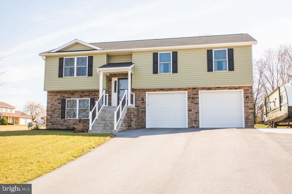 This Beautiful 2019 Bi-Level Home Is Waiting For You!!  Located on a corner lot in a small country development on over a half acre lot in Hillview Estates.  This home is just 8 miles from Letterkenny and close to the Pa Turnpike.  The builder made the hallway 4 feet instead of the typical width, used Trex decking and railing on the front & back porches, added a 36x15 (approx.) concrete pad to the right of the home and added a water softening system to the well.  The 10X12 storage shed that conveys was also built in 2021.  Schedule your tour today for this 3 bedroom 2 1/2 bath approximately 2100 square foot home.