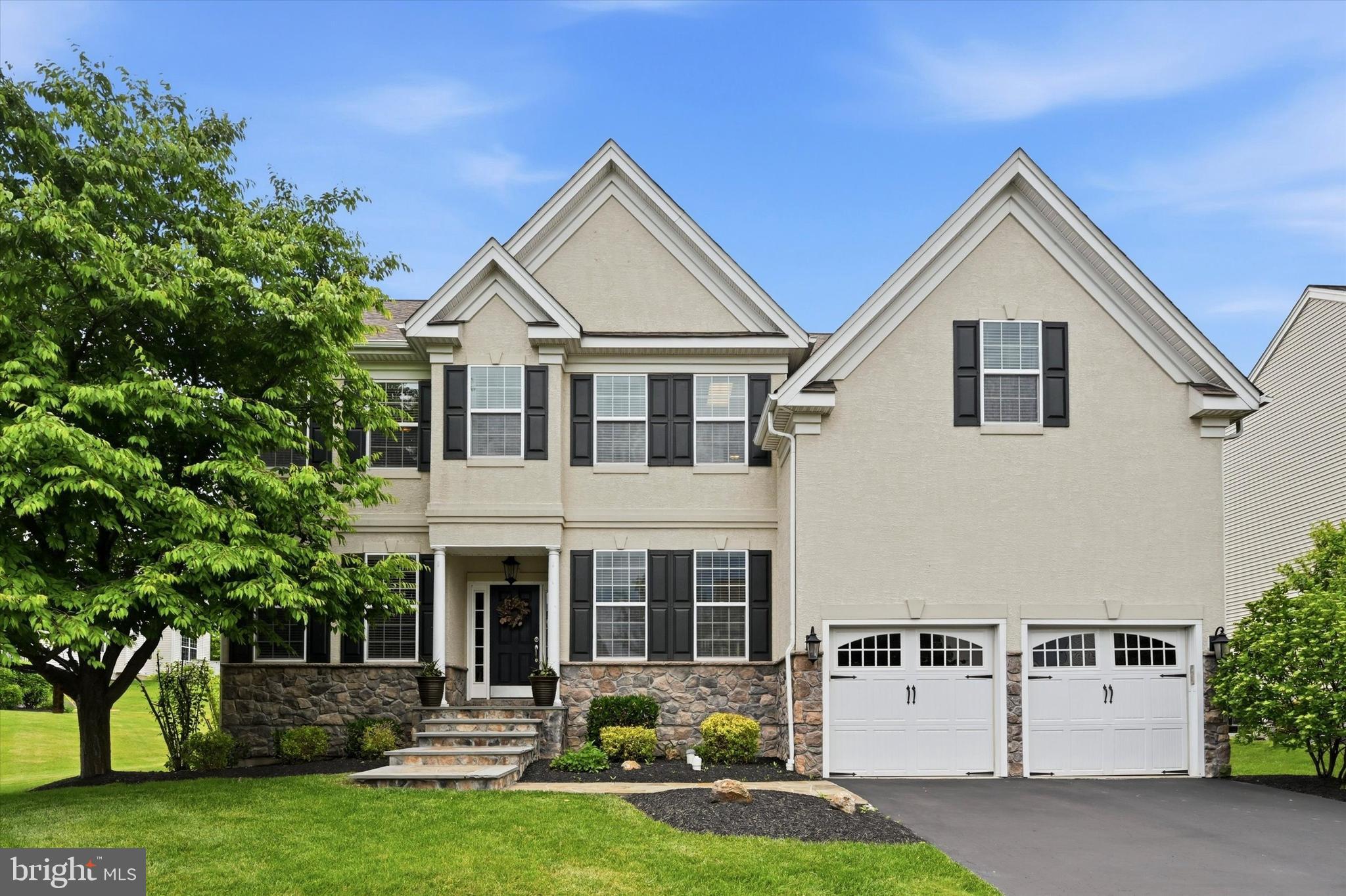 Welcome to 4117 Crescent Drive, a beautifully maintained and move-in ready home in the prestigious Byers Station community. From the moment you arrive, you’ll appreciate the exceptional curb appeal, highlighted by a flagstone and fieldstone front porch, inviting walkway, and professionally refreshed landscaping.
Step inside to a dramatic two-story foyer featuring cathedral ceilings and gleaming hardwood floors that flow throughout the main level. The formal living and dining rooms are elegantly appointed with crown molding and wainscoting, creating the perfect setting for entertaining and special occasions.
The heart of the home is the stunning two-story family room, filled with natural light and centered around a marble-surround gas fireplace. The adjacent gourmet kitchen was expanded with an eight-foot addition, offering abundant space for gathering and everyday living. Featuring granite countertops, a large center island, stainless steel appliances, custom lighting, wall ovens, and a spacious breakfast room, this kitchen is designed to impress.
A private home office with a stylish glass door and a conveniently located powder room complete the main level.
Upstairs, the luxurious primary suite offers spacious closets and a beautifully appointed ensuite bath. Four additional bedrooms provide ample space for family and guests, including a private princess or guest suite with its own full bath. Hardwood flooring in the hallway and primary bedroom adds warmth and elegance throughout the second level. A conveniently located laundry room completes the upper floor.
The finished walkout lower level significantly expands the living space and features upgrading flooring, a wet bar, custom cabinetry, a full bathroom, and abundant storage. Step outside to enjoy the fully fenced backyard and expansive EP Henry paver patio—perfect for outdoor entertaining, dining, or relaxing.
Residents of Byers Station enjoy resort-style amenities including two clubhouses, two swimming pools, fitness center, tennis courts, basketball courts, volleyball courts, playgrounds, and miles of walking and biking trails.
Ideally located with convenient access to Routes 100, 30, the Pennsylvania Turnpike, and major employment centers, shopping, dining, and entertainment. Located within the award-winning Owen J Roberts School District. 
This exceptional home offers the perfect blend of luxury, space, and community living. Don’t miss the opportunity to make it yours.