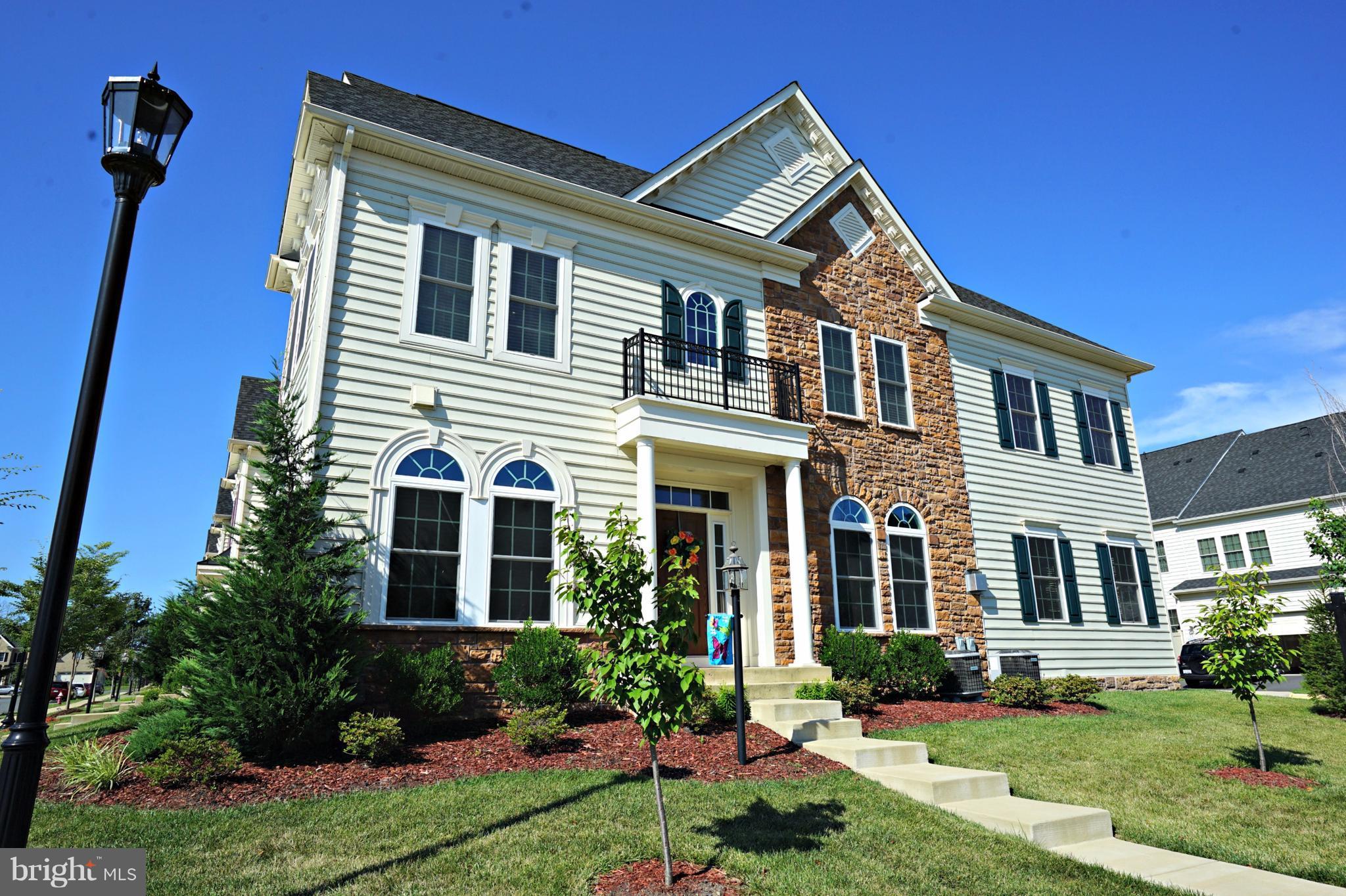 Rarely available Grand Villa!  Very desirable end location with lots of sunlight!  Beautifully appointed with fabulous upgrades throughout.  5 bedrooms & 4.5 baths with a spacious finished lower level.  Wonderful Avonlea community with pool, lake and trails! Shows like a model!  Only 4 years young!